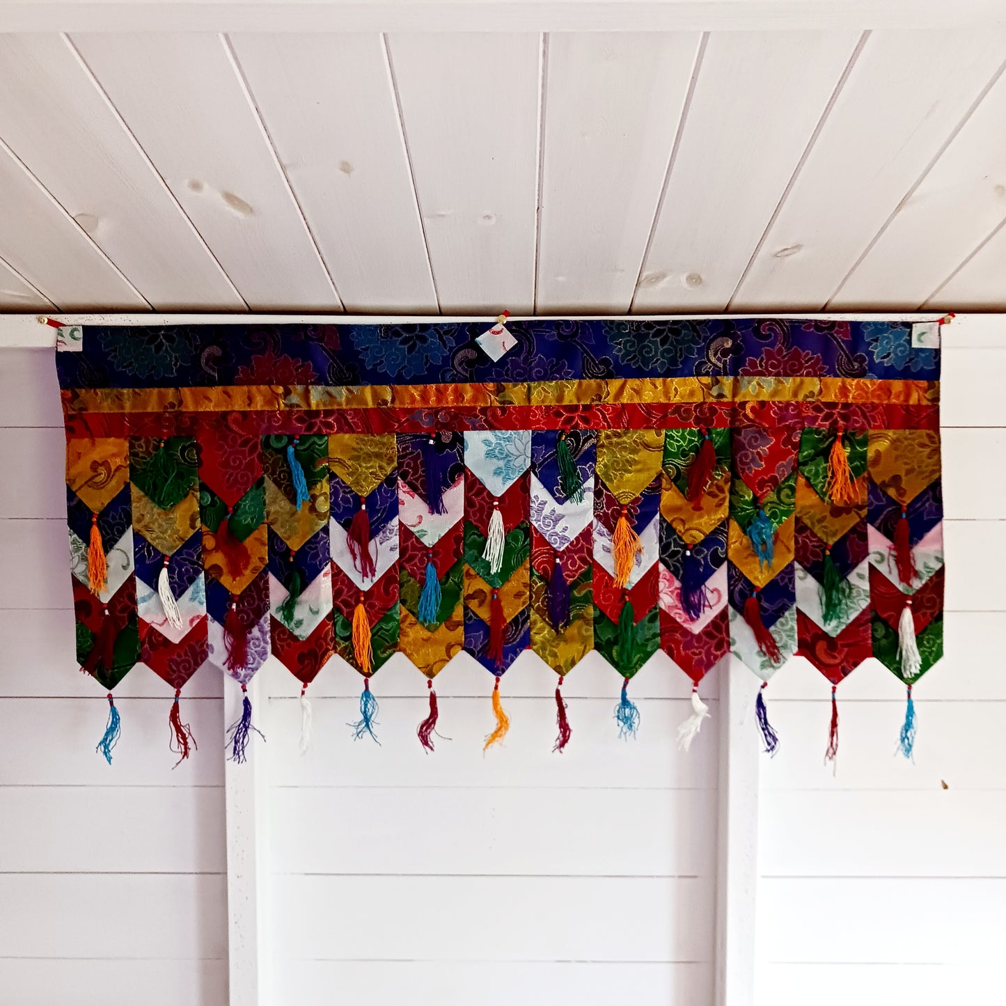 Hang this Tashi Tha-Ring Shambu Banner around the door of your shrine room, or along the ceiling.&nbsp; This style is often displayed outside monasteries during ceremonies, suspended between poles above the building.