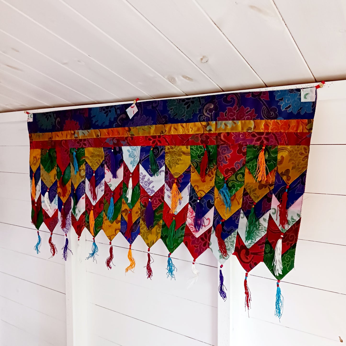 Hang this Tashi Tha-Ring Shambu Banner around the door of your shrine room, or along the ceiling.&nbsp; This style is often displayed outside monasteries during ceremonies, suspended between poles above the building.