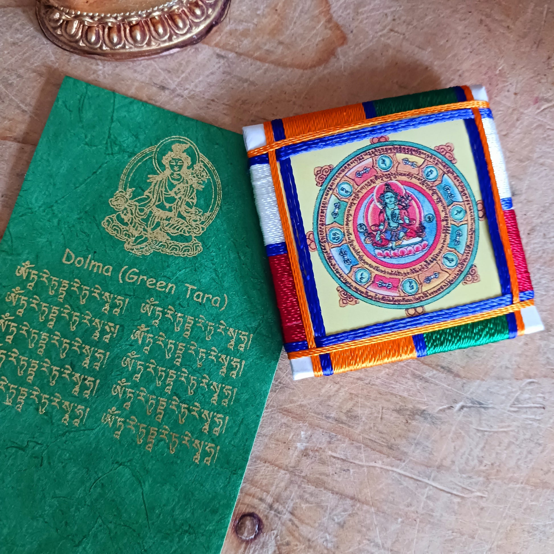 Experience divine protection with the handmade Green Tara Protection Amulet, a masterpiece of spirituality crafted in Nepal.