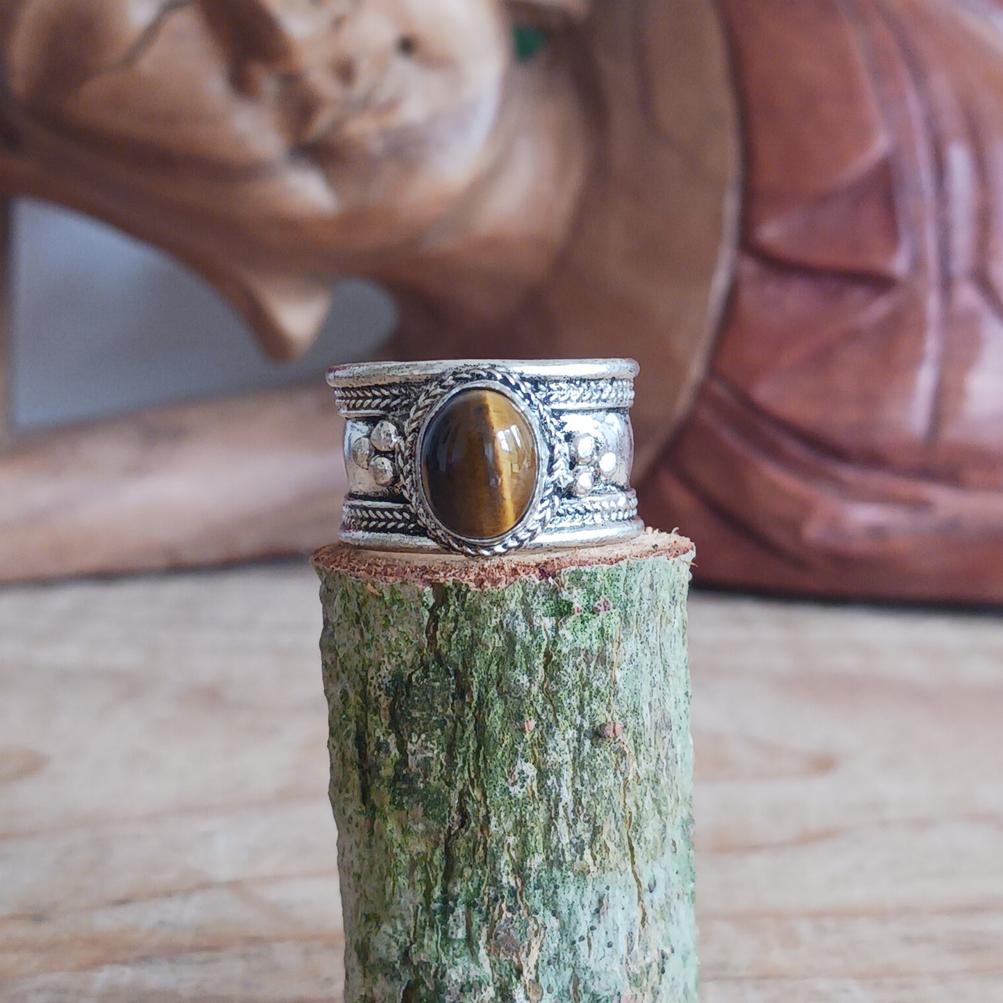 Tibetan white metal finger ring decorated with Tiger's Eye stone.