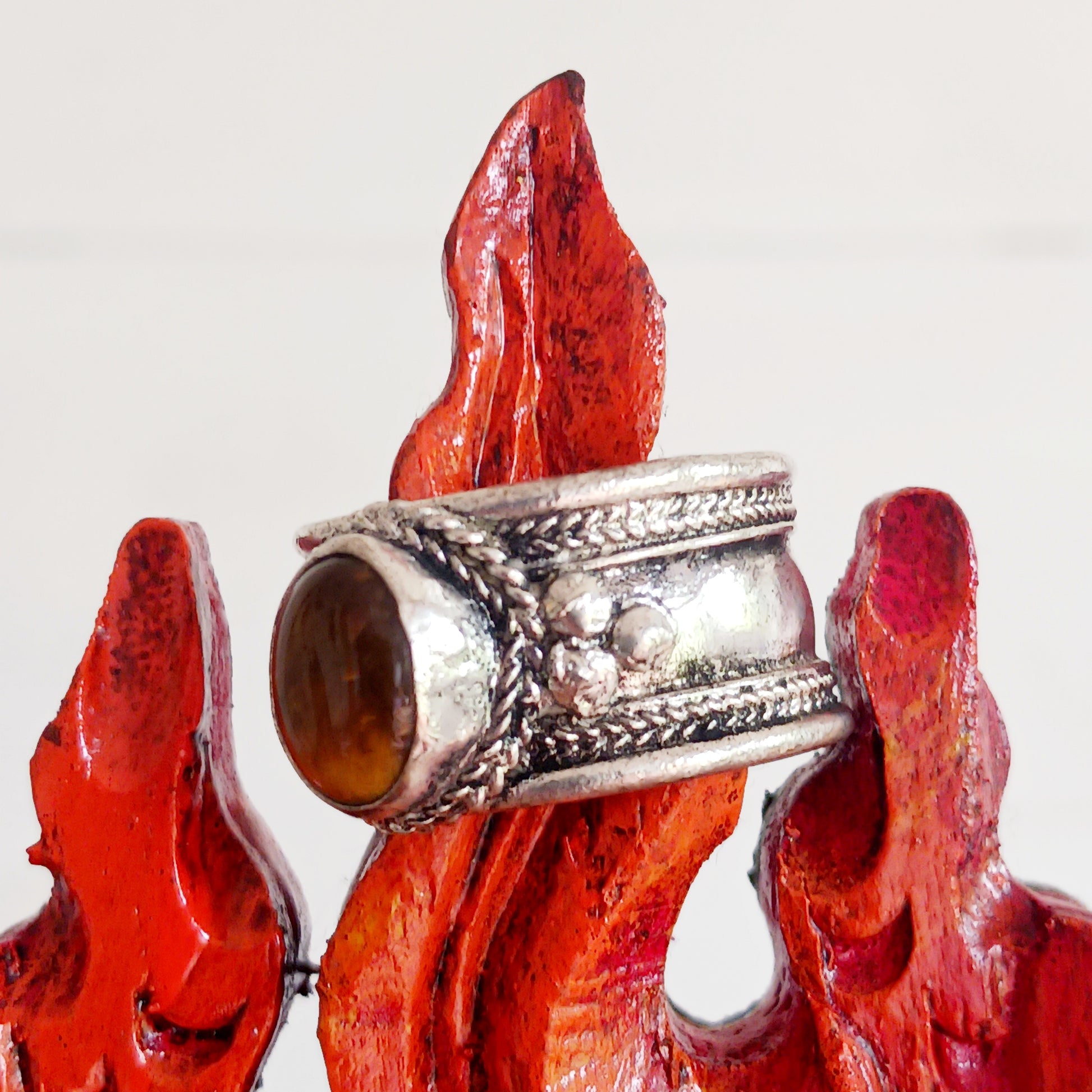 Tibetan white metal finger ring decorated with Tiger's Eye stone.