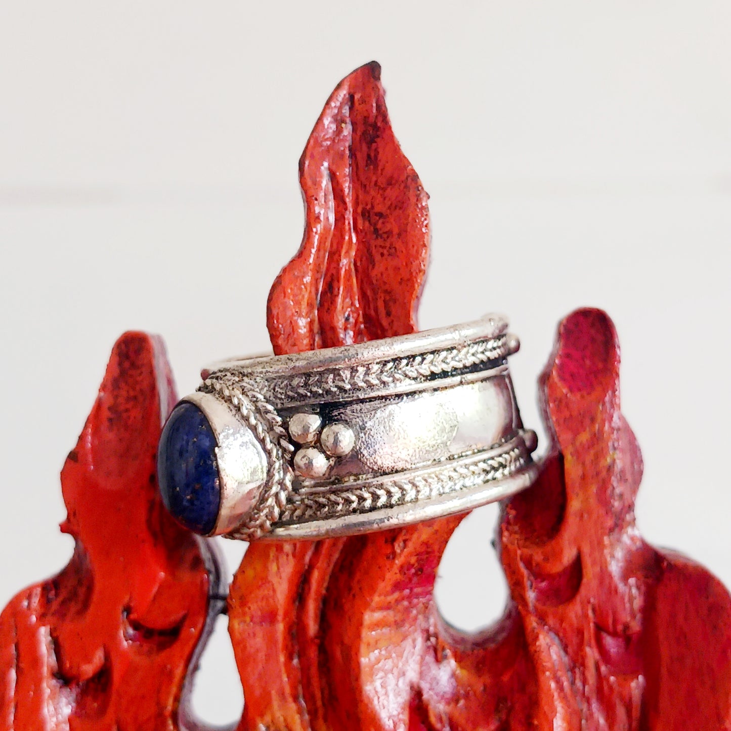 Nepalese white metal finger ring decorated with a blue Lapis stone.