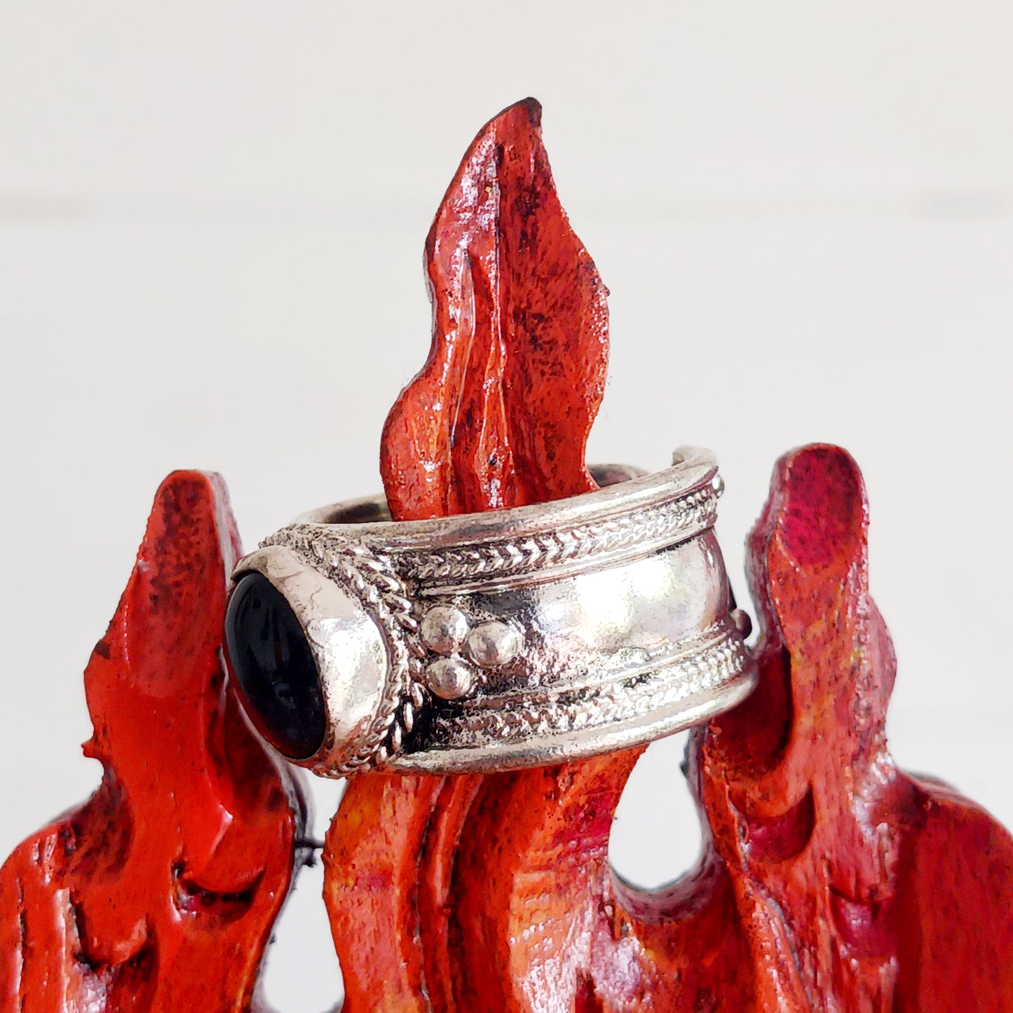 Nepalese white metal finger ring decorated with a black tourmaline stone.