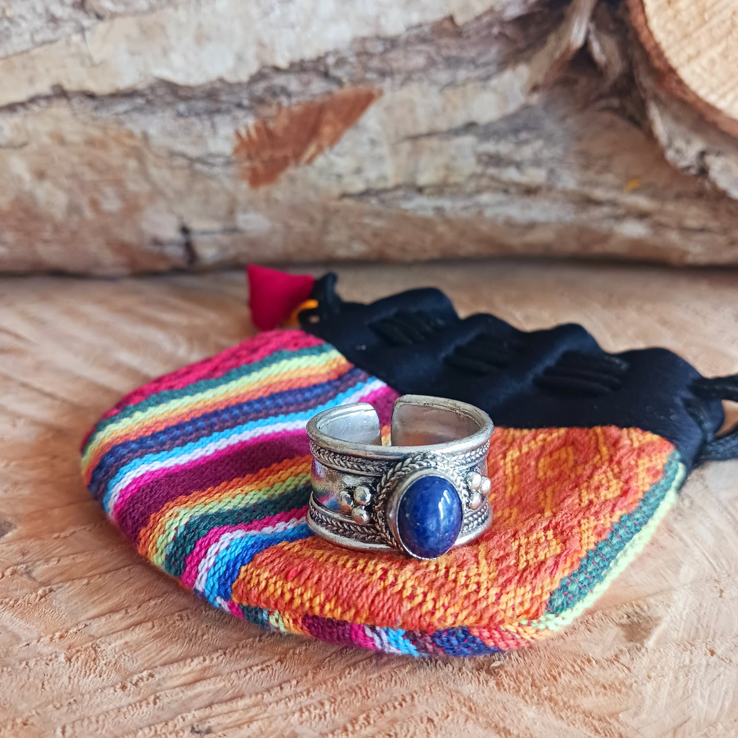 Nepalese white metal finger ring decorated with a blue Lapis stone.