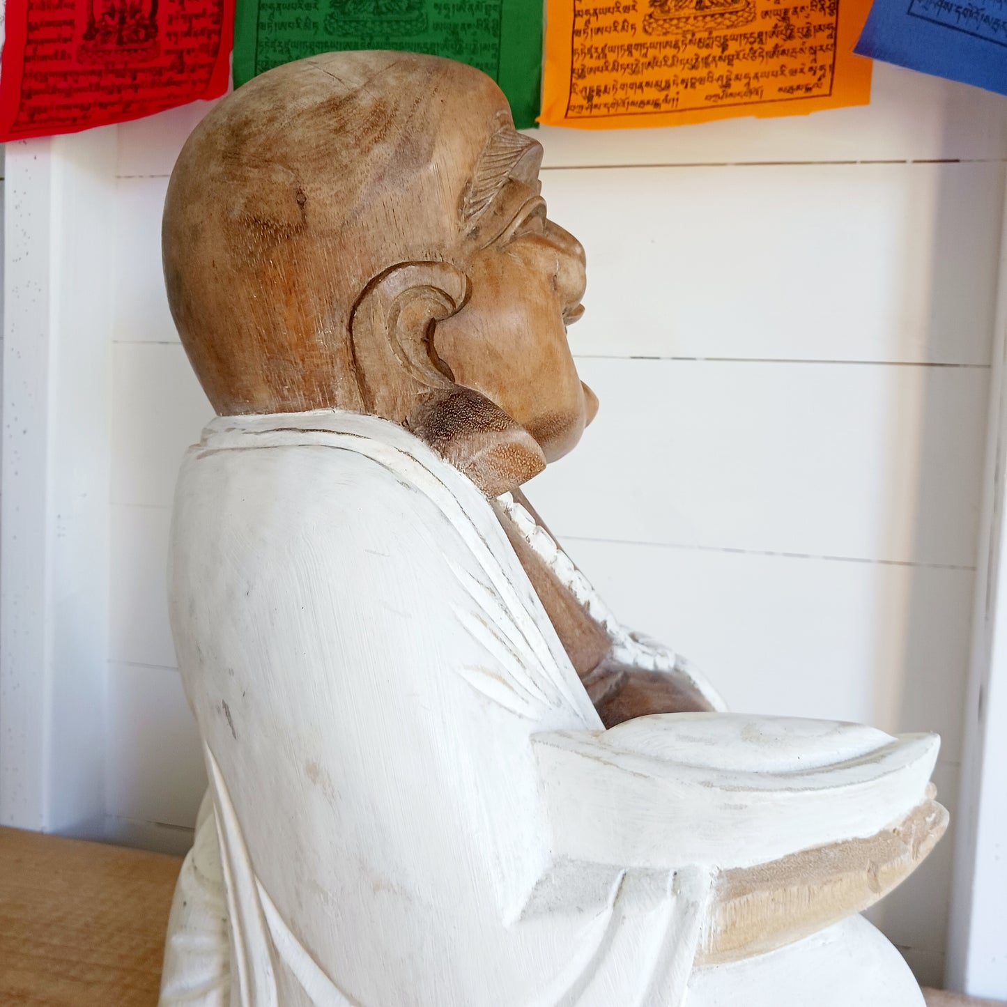 This large and beautifully Happy Buddha statue is hand carved by skilled artisans, using traditional Balinese tools. 