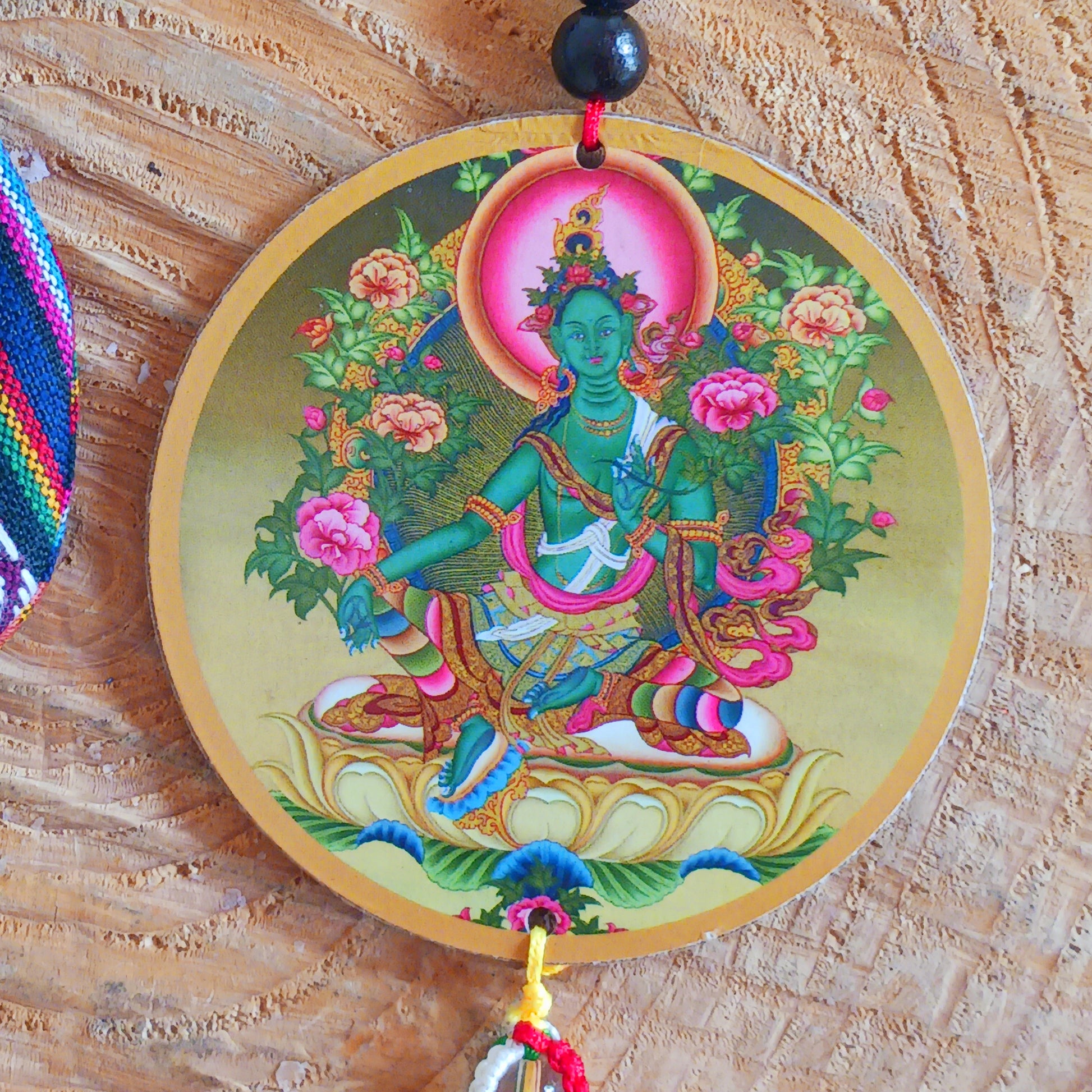 Green Tara is a female Buddha. Her name means Star or bridge, transition. Metaphor for: she who helps to cross the ocean of suffering. Green Tara is depicted as a young girl or woman, relaxed, playful and dynamic. 