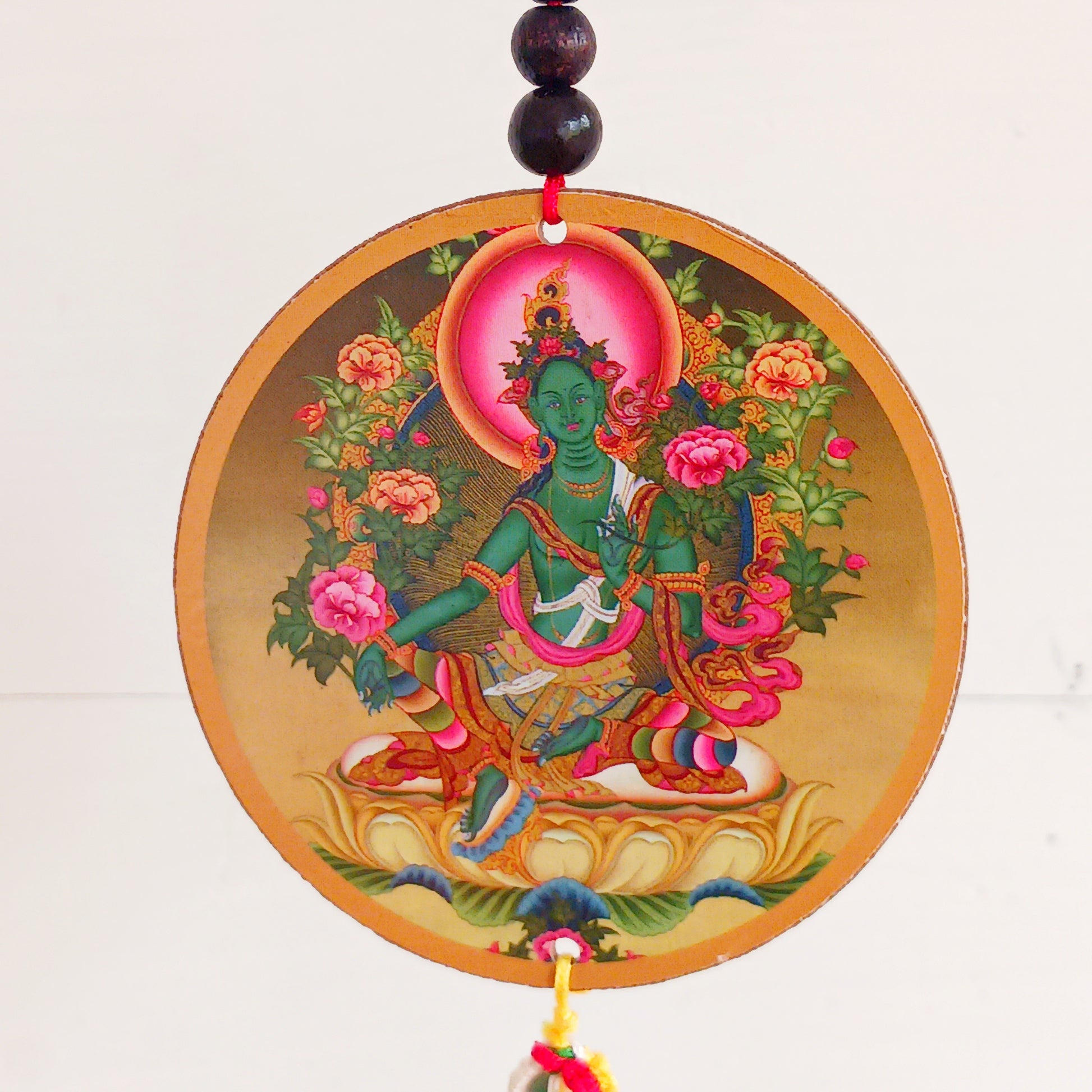 Green Tara is a female Buddha. Her name means Star or bridge, transition. Metaphor for: she who helps to cross the ocean of suffering. Green Tara is depicted as a young girl or woman, relaxed, playful and dynamic. 