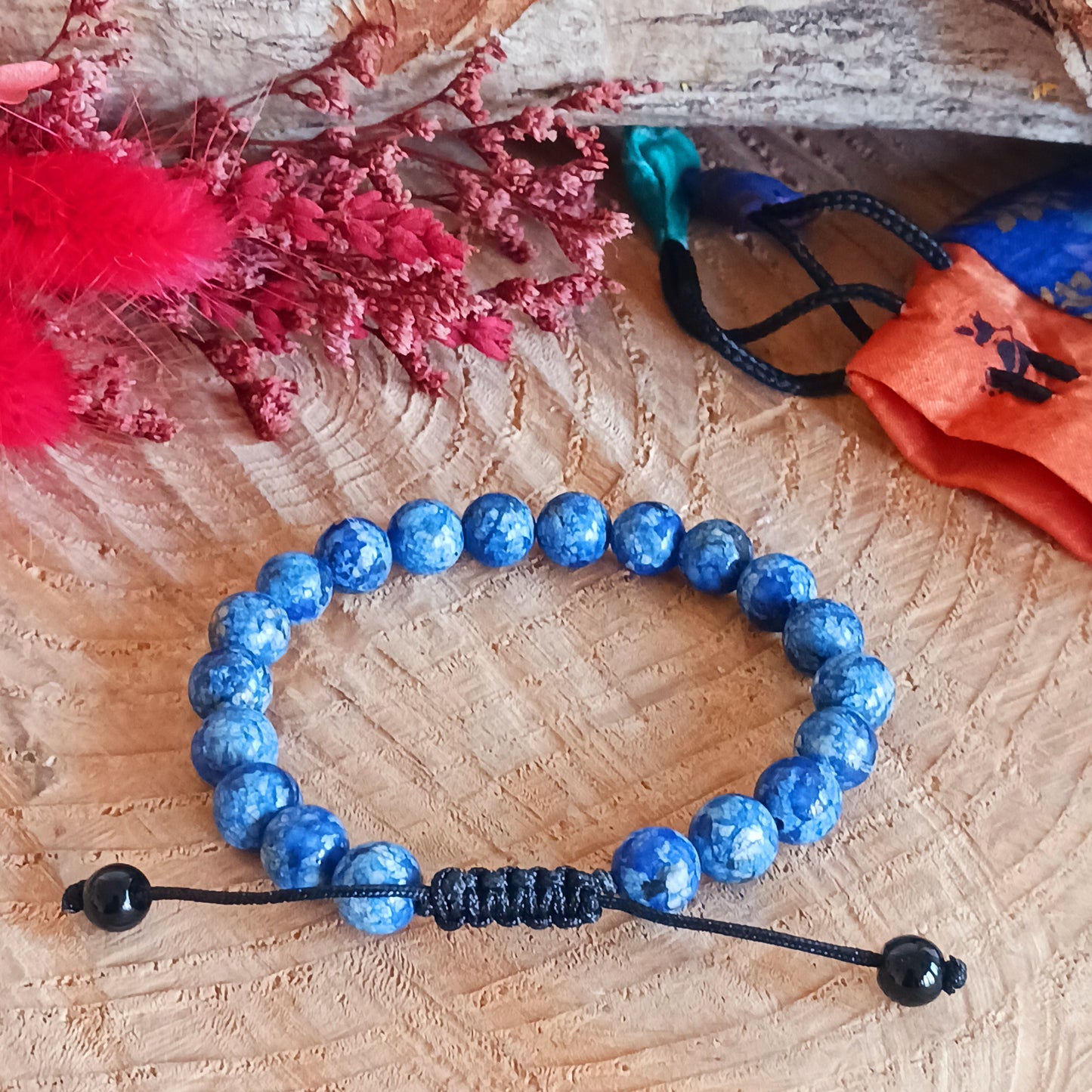 Malas are used for counting mantras, which are short sacred phrases.  The beads are often made from seeds, gemstones, or wood, and may have a "guru" bead, tassel, or special knot.