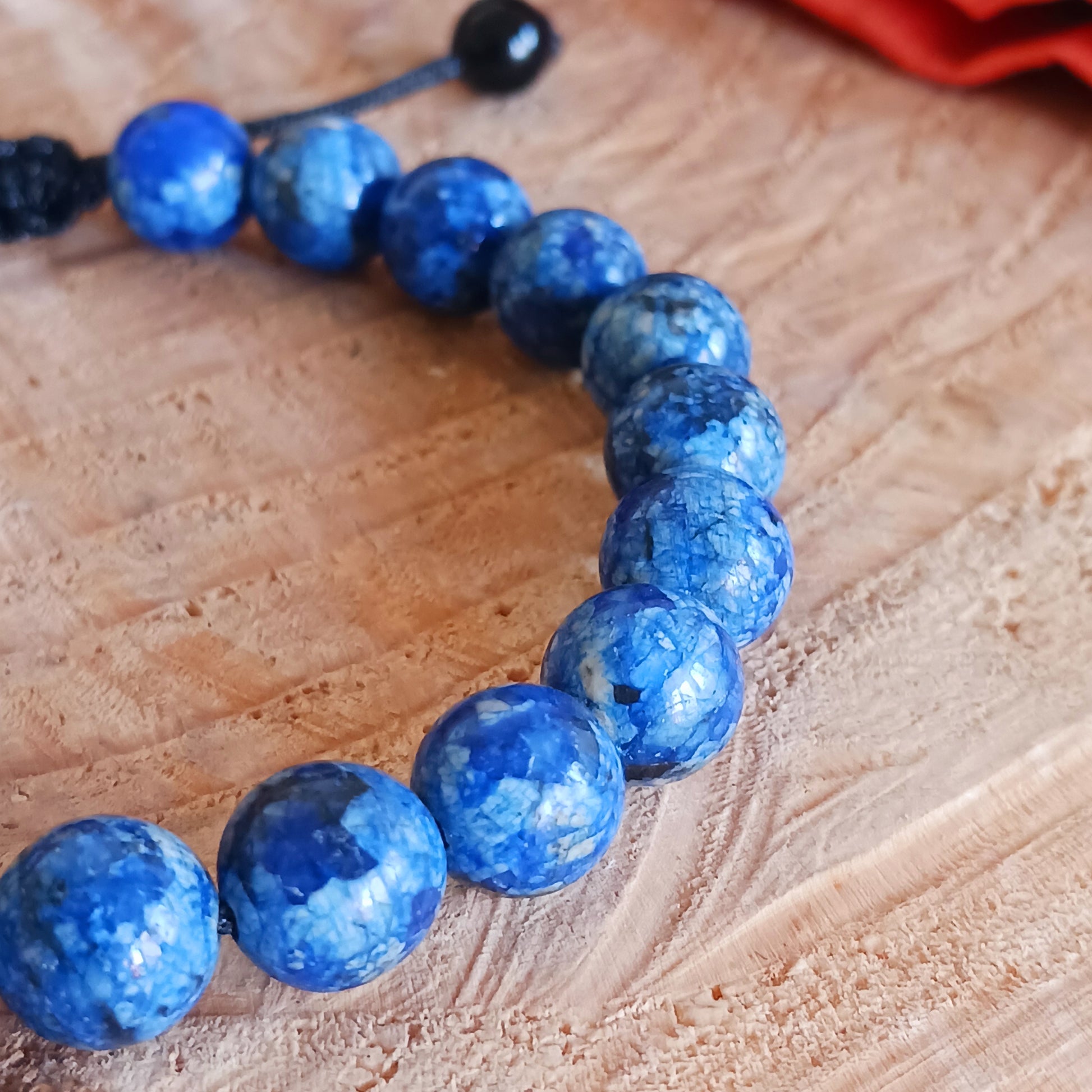 Malas are used for counting mantras, which are short sacred phrases.  The beads are often made from seeds, gemstones, or wood, and may have a "guru" bead, tassel, or special knot.