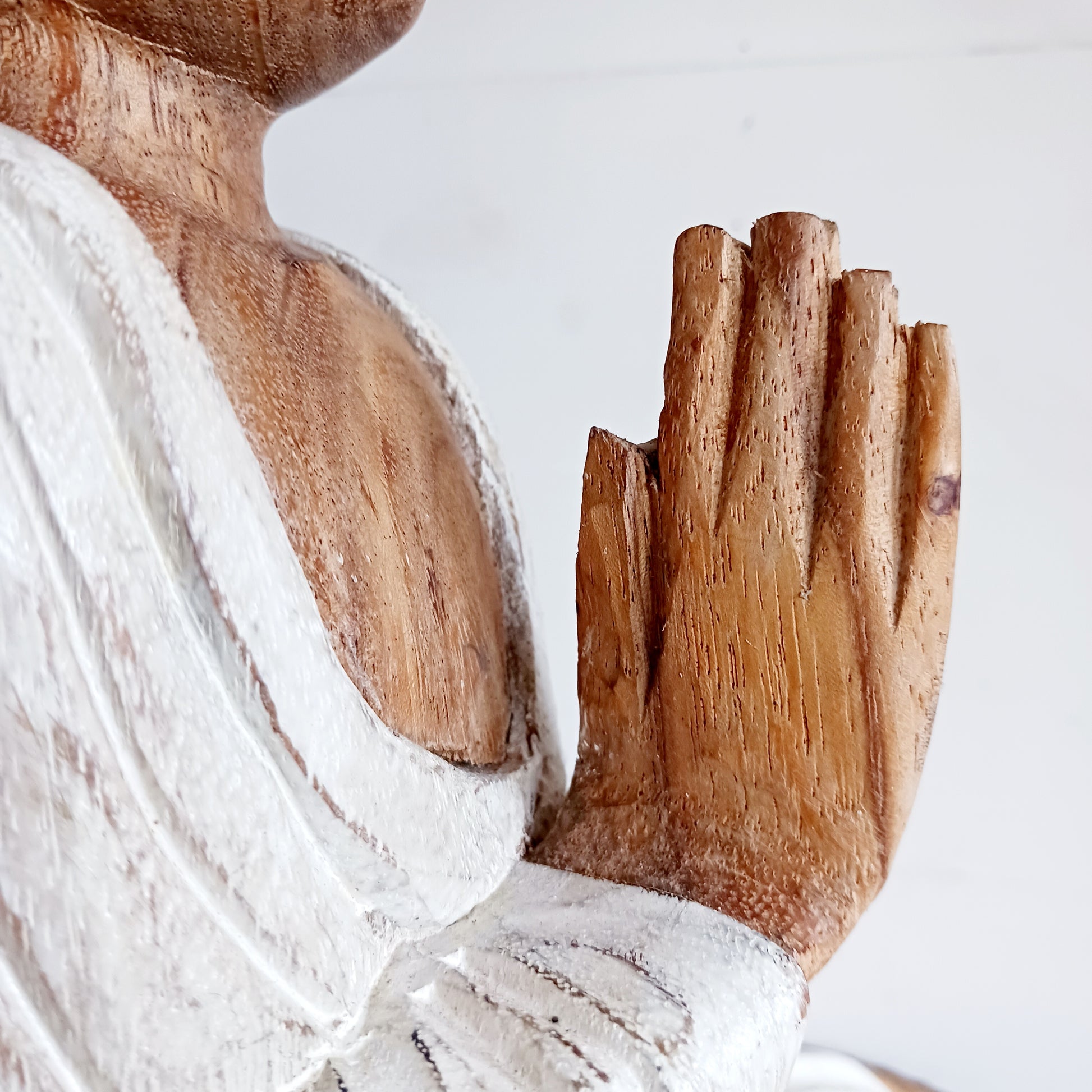 This Buddha statue has been carved by hand from Suar wood which is a fast-growing species, allowing for sustainable cultivation. The Albizia Saman species of tree is widespread, abundant, and in no danger of extinction. The Buddha is carved using tools in the traditional Balinese way, bringing each detail to life in a three-dimensional work of art. Hand carved Buddha statues can take up to weeks to carve and this particular Buddha has a white-wash finish.