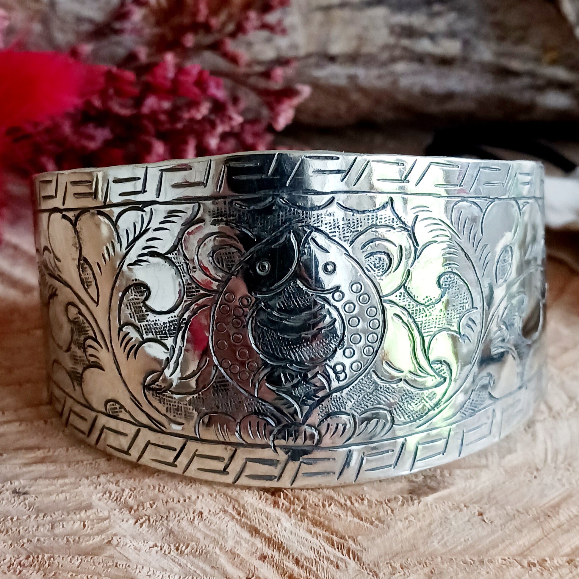 Discover the timeless elegance of our White Metal Cuff Bracelet, intricately hand-etched in Nepal with a variety of sacred Buddhist symbols. These chunky yet graceful bracelets are more than just accessories—they’re meaningful pieces that add a touch of spirituality and style to any outfit.