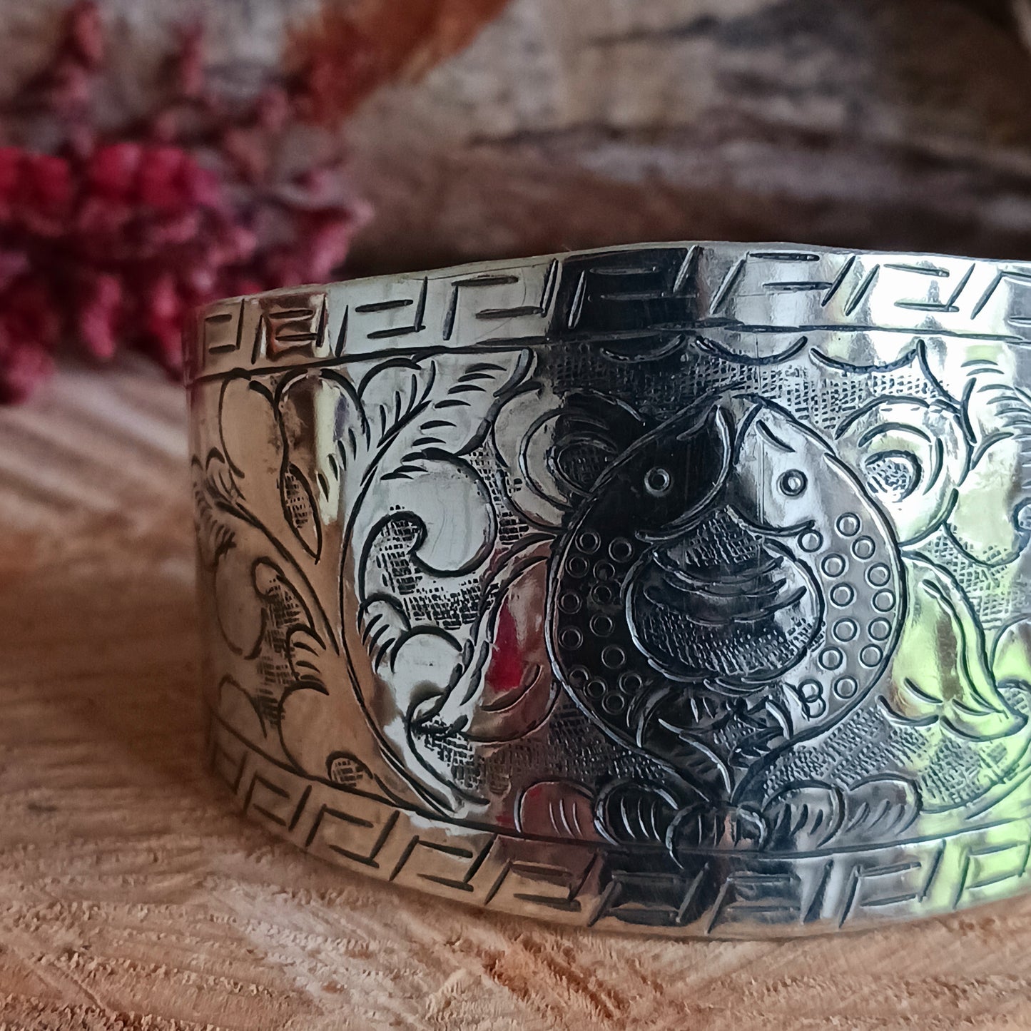 Discover the timeless elegance of our White Metal Cuff Bracelet, intricately hand-etched in Nepal with a variety of sacred Buddhist symbols. These chunky yet graceful bracelets are more than just accessories—they’re meaningful pieces that add a touch of spirituality and style to any outfit.