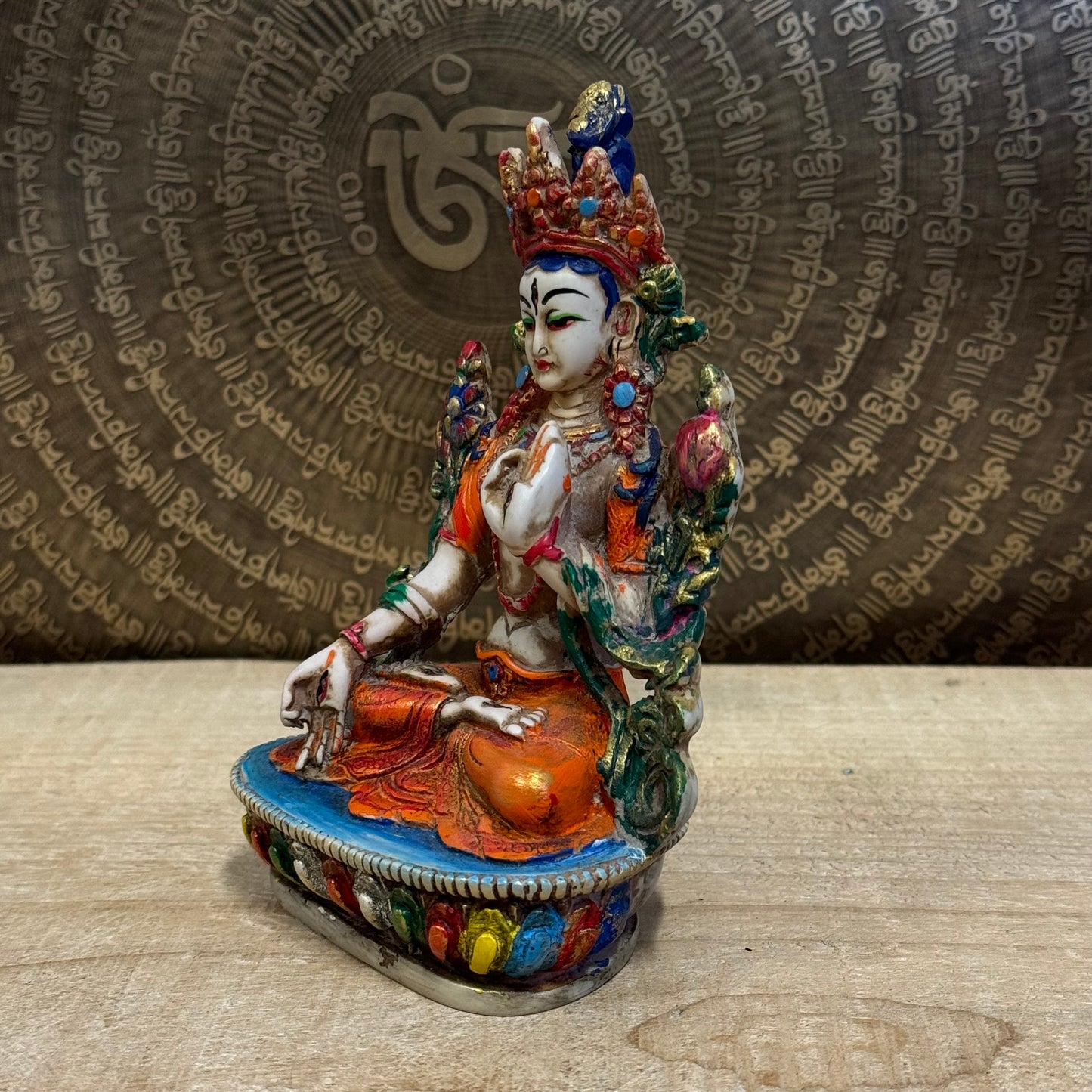 White Tara is known for compassion, long life, healing and serenity and is shown here with her right hand in the varada mudra (blessing pose.) White Tara is distinct from the more commonly seen Green Tara. She is seated in a tranquil, full lotus position as opposed to Green Tara's one foot extended pose. These intricate resin statues are carefully handcrafted In Nepal.

Size: 14.5cm