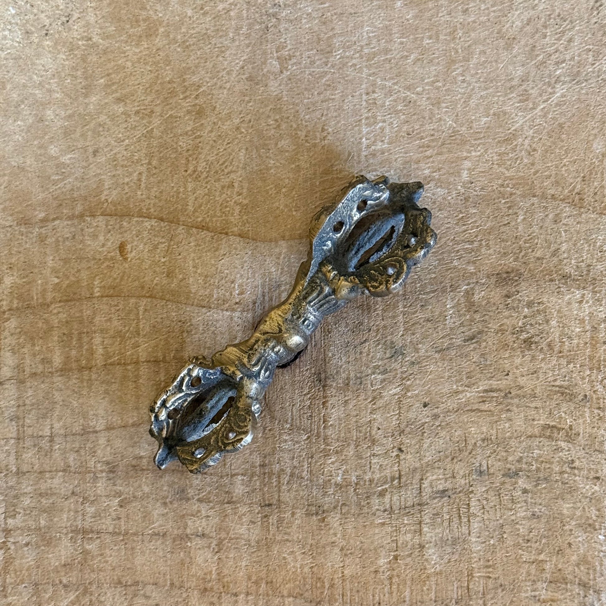 Handmade Dorje Vajra 7.5cm in solid brass. Sacred Tibetan Buddhist ritual object for meditation, altar use, and spiritual practice.
