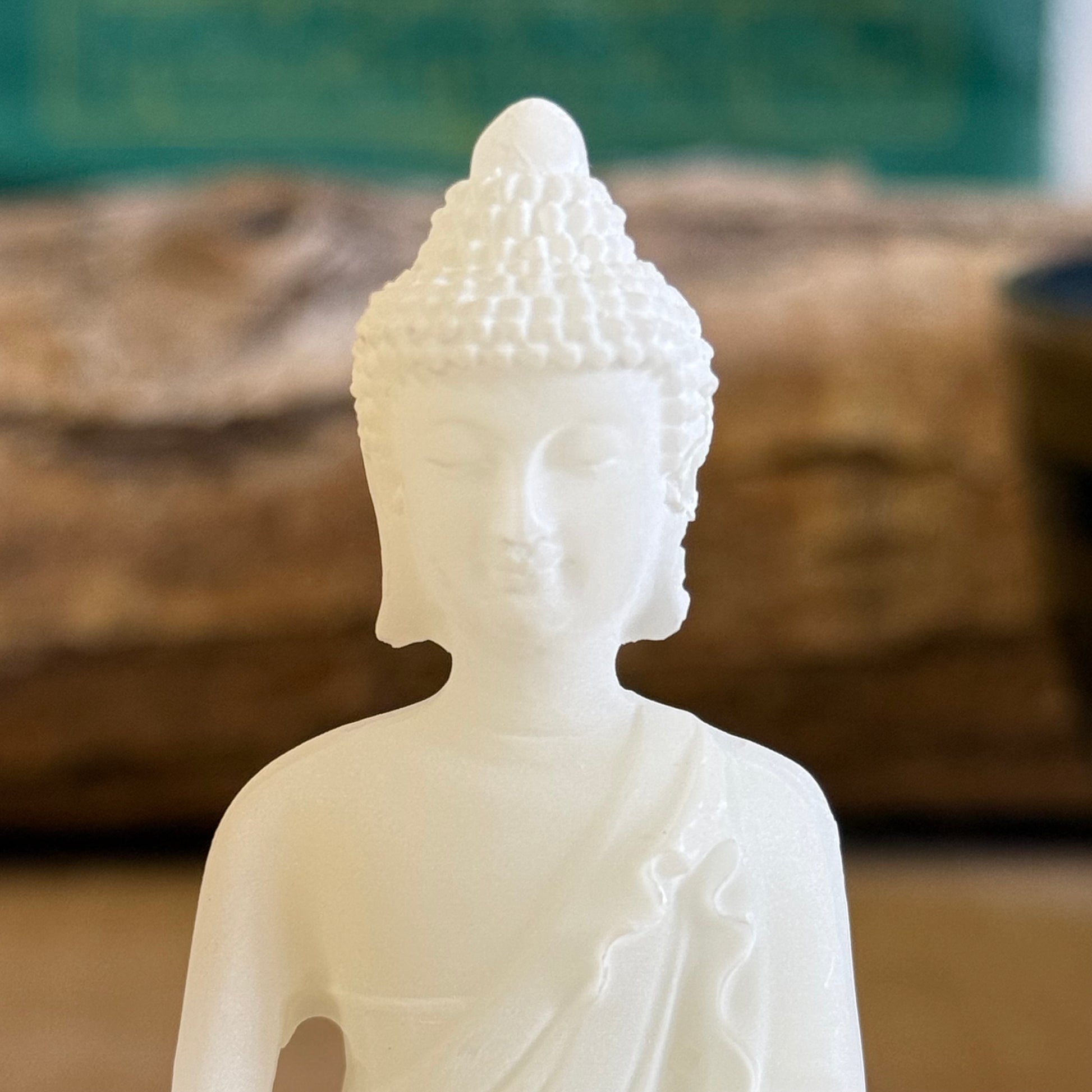 Discover the Bhumisparsha Buddha Statue, symbolizing enlightenment and inner strength. Made from durable polyresin, this 8.5cm figurine is perfect for meditation spaces and spiritual decor