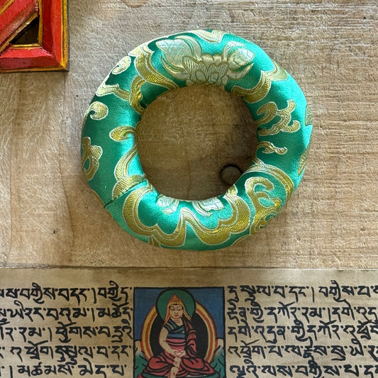 Elegant 11cm doughnut cushion cradles singing bowls in style. Ideal for healers & spiritual practice. Fits small to medium bowls. Shop at Buddha-Buddha.com.