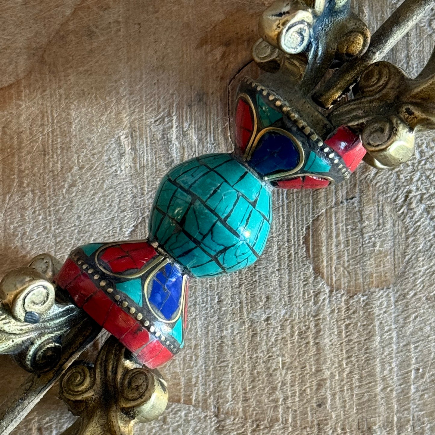Handmade Flower Dorje vajra in solid brass with turquoise inlay. A sacred Tibetan Buddhist ritual object for altars, shrines, and Vajrayana practice.