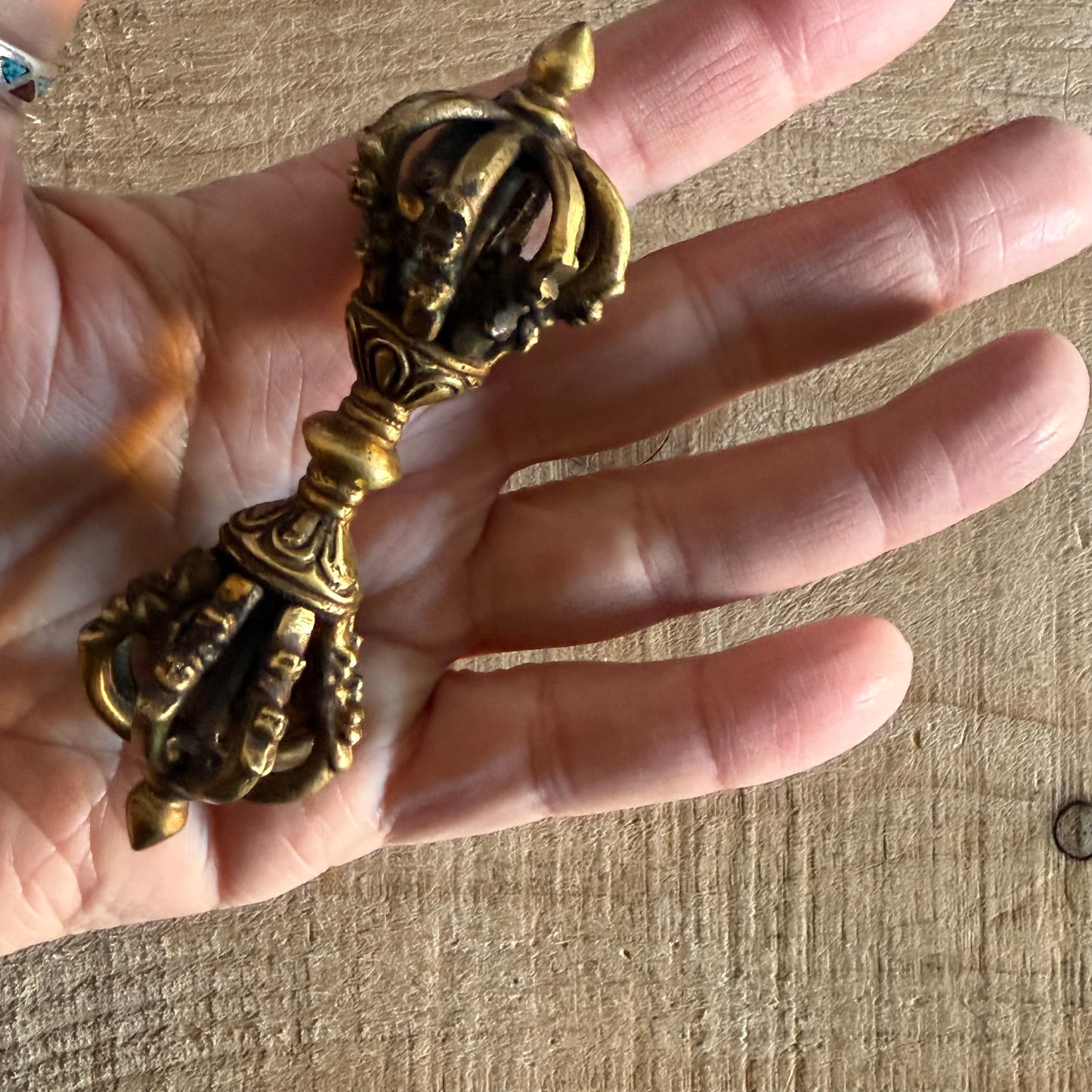 10cm Kirtimukha Dorje vajra, a sacred Tibetan Buddhist ritual object symbolising compassion, protection, and indestructible awakened action.