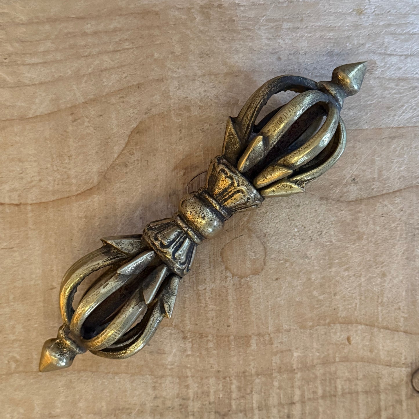 18cm Lotus Dorje vajra from Nepal, a sacred Tibetan Buddhist ritual object symbolising indestructibility, wisdom, and compassionate Vajrayana practice.