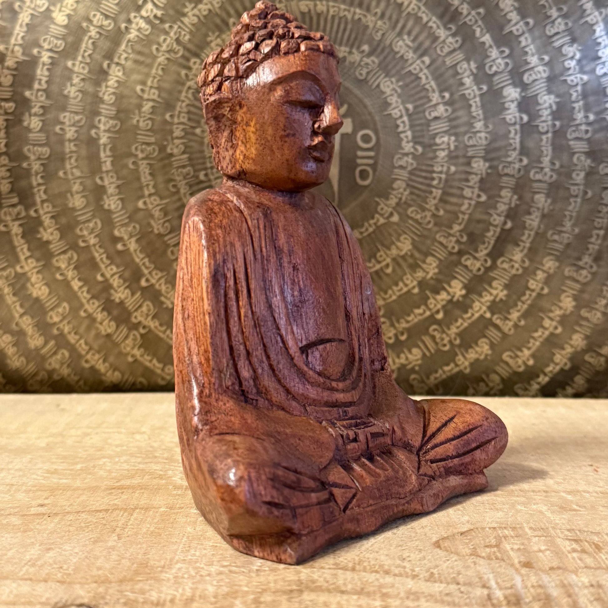 Hand carved 15cm wooden Buddha statue from Bali in the Dhyan Mudra. A serene meditation figure perfect for altars, sacred spaces and spiritual practice.