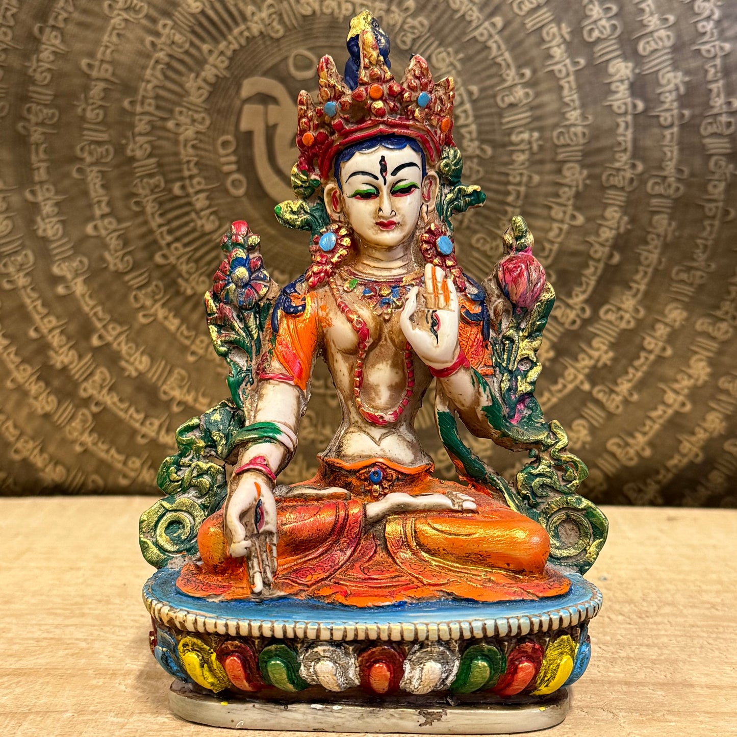 White Tara is known for compassion, long life, healing and serenity and is shown here with her right hand in the varada mudra (blessing pose.) White Tara is distinct from the more commonly seen Green Tara. She is seated in a tranquil, full lotus position as opposed to Green Tara's one foot extended pose. These intricate resin statues are carefully handcrafted In Nepal.

Size: 14.5cm