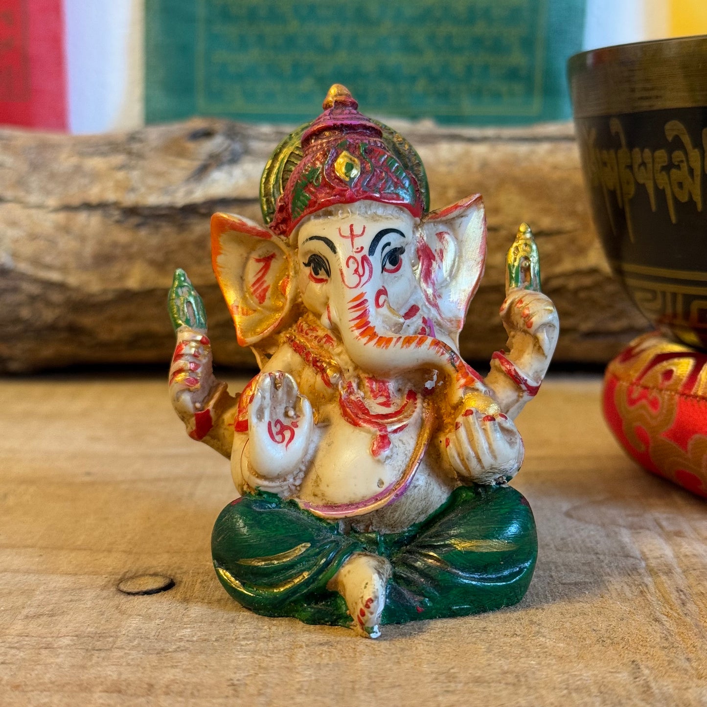 These hand-painted resin figurines depict the elephant headed deity Ganesh. A very popular Hindu god, he is known as the remover of obstacles, deva of intellect and wisdom and as the patron of the Arts and Sciences.