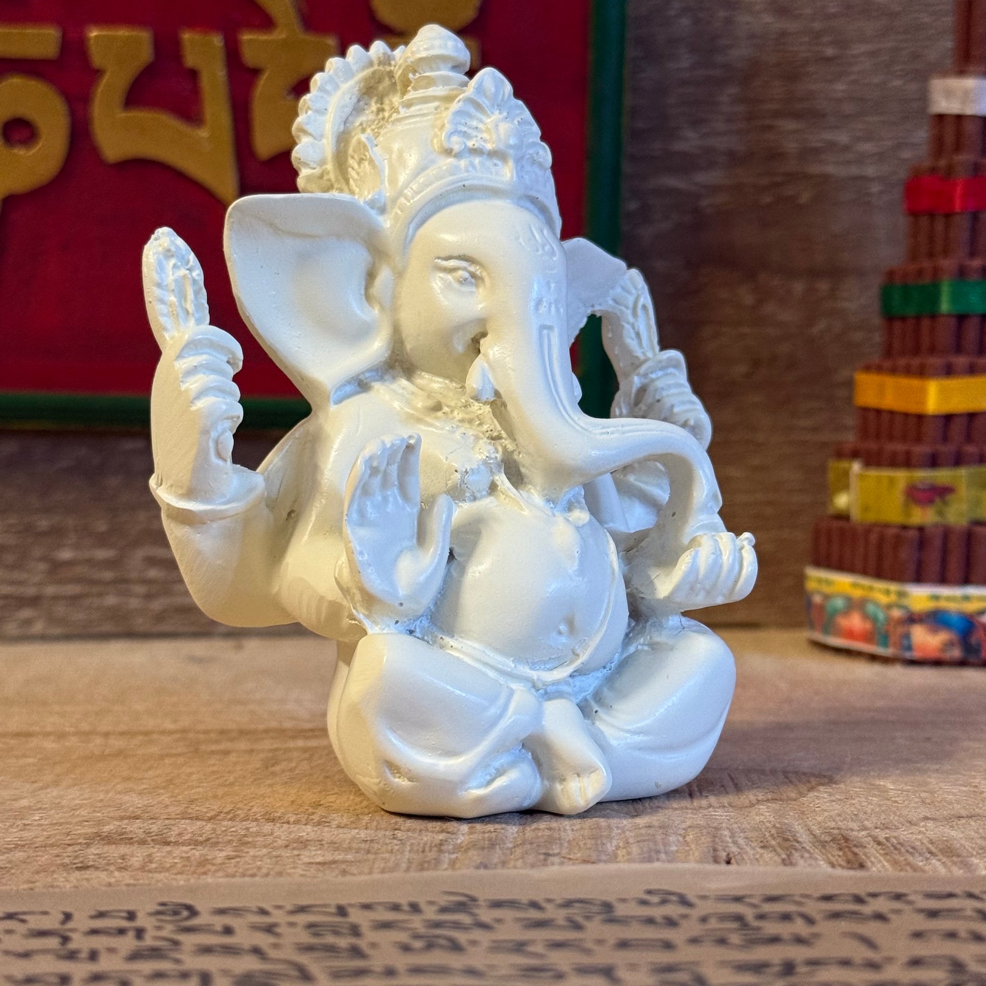 Invite blessings and good fortune into your home with this beautiful statue of Lord Ganesh, the revered elephant-headed god of wisdom, success, and prosperity. Handcrafted from durable poly resin and standing approximately 11cm tall, this piece captures Ganesh’s serene expression and four symbolic arms, each representing divine power and protection.