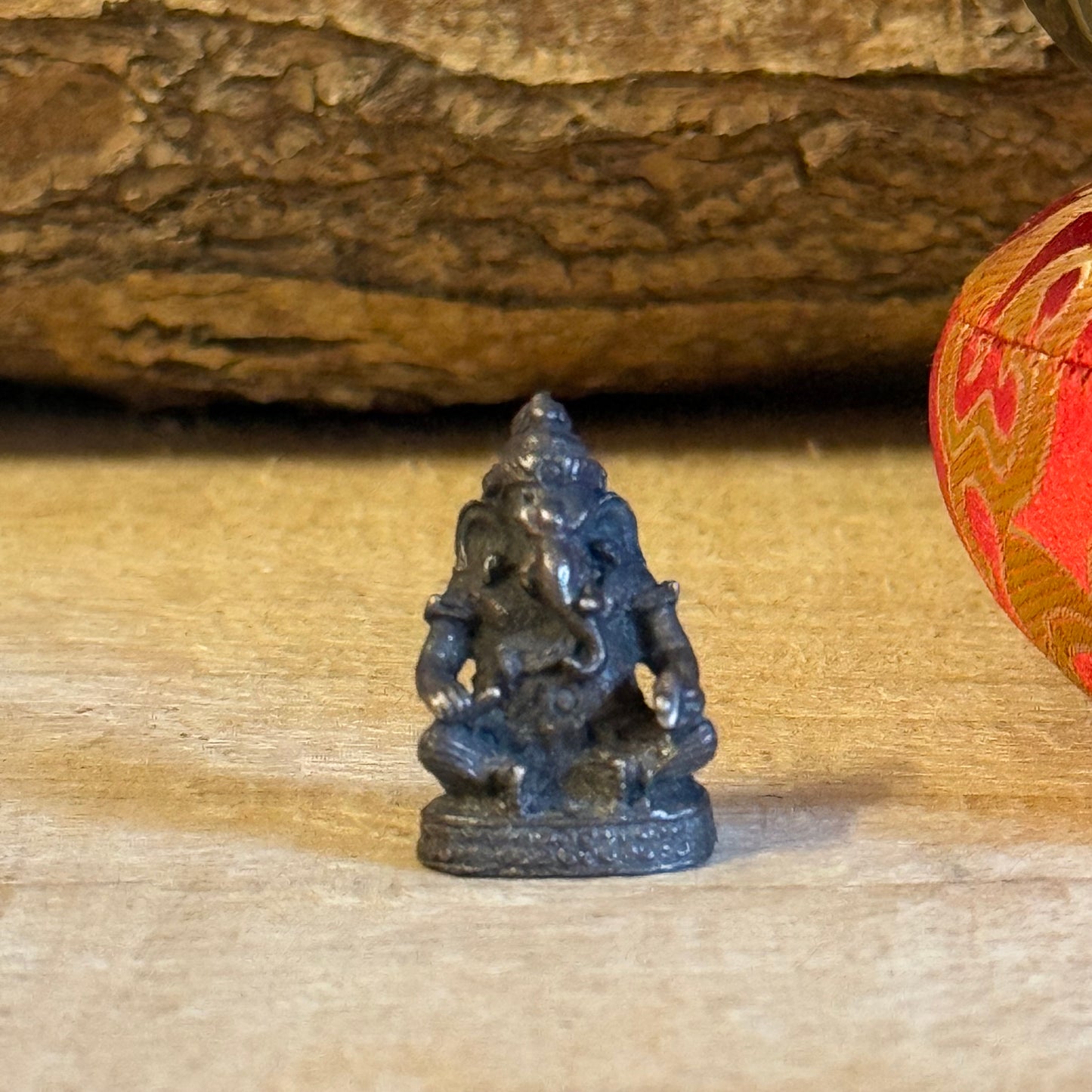 Discover handcrafted Nepalese miniature Ganesh figurines, symbolizing wisdom and the removal of obstacles. Compact, lightweight, and perfect for altars or gifts. Ethically made in Nepal.