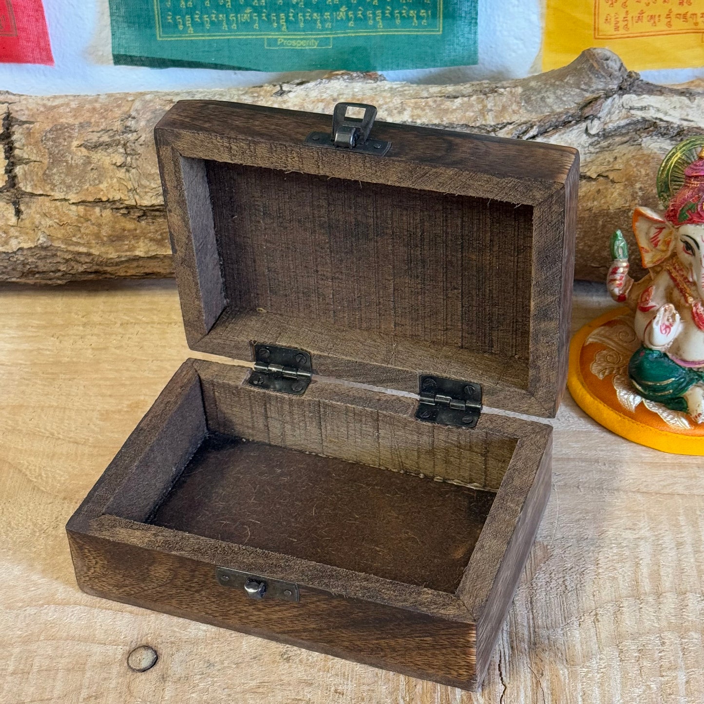 &nbsp;Wooden Keepsake Box - Buddha

Discover the beauty of handcrafted artistry with this lovely mango wood box, hand-carved in India. Perfect for storing trinkets, jewelry, and cherished keepsakes, this box combines charm and functionality with its unique design and sturdy construction.