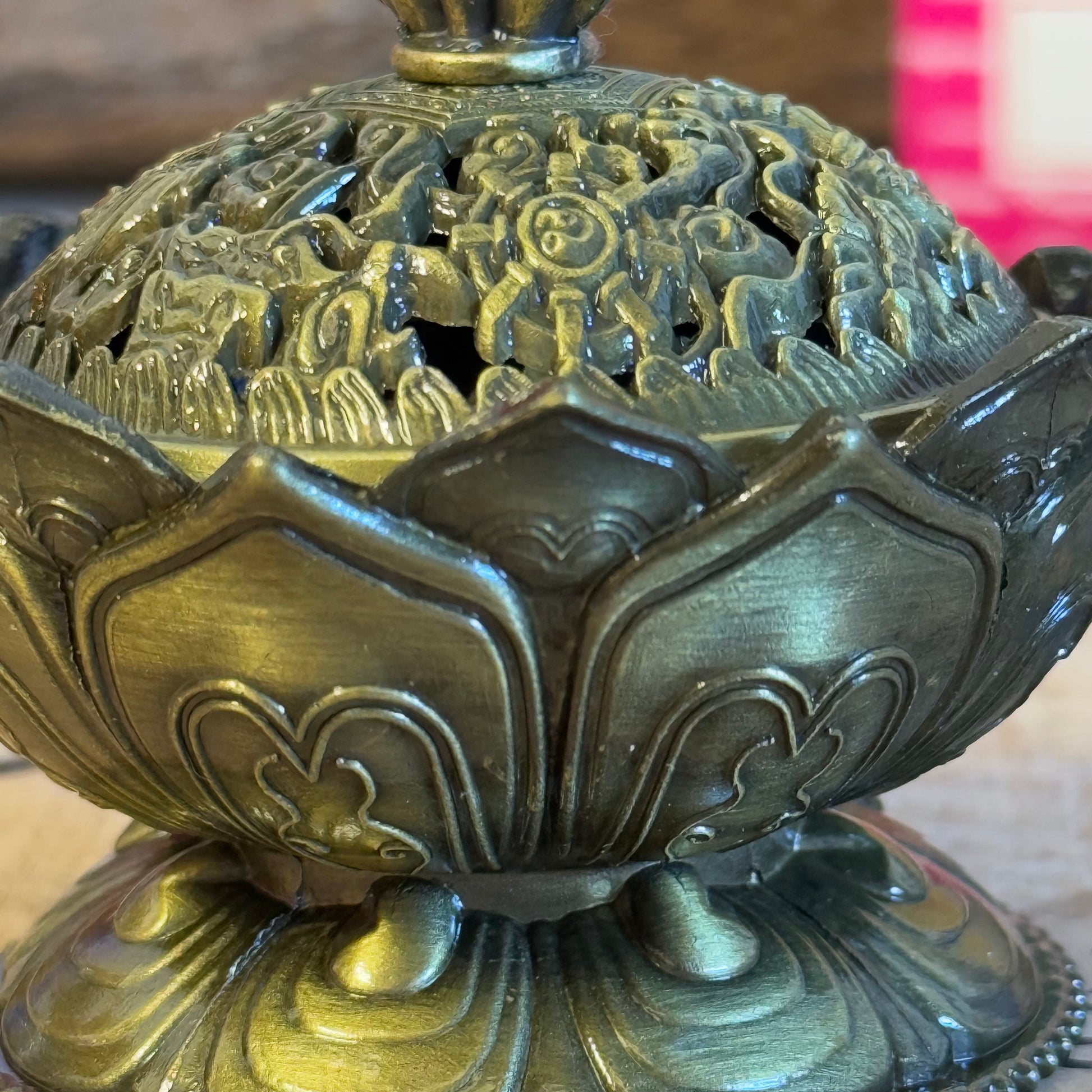 Enhance your home’s ambiance with this beautiful brass cone holder, thoughtfully designed in the shape of a lotus flower. Whether used for burning incense cones or as a charming decorative piece, this holder is both functional and elegant.

Key Features:
Elegant Lotus Design: The intricate lotus flower shape symbolizes purity and serenity, making it a meaningful addition to any space.
Majestic Smoke Display: Watch as the smoke gracefully curls through the lid’s opening, creating a soothing and captivating e