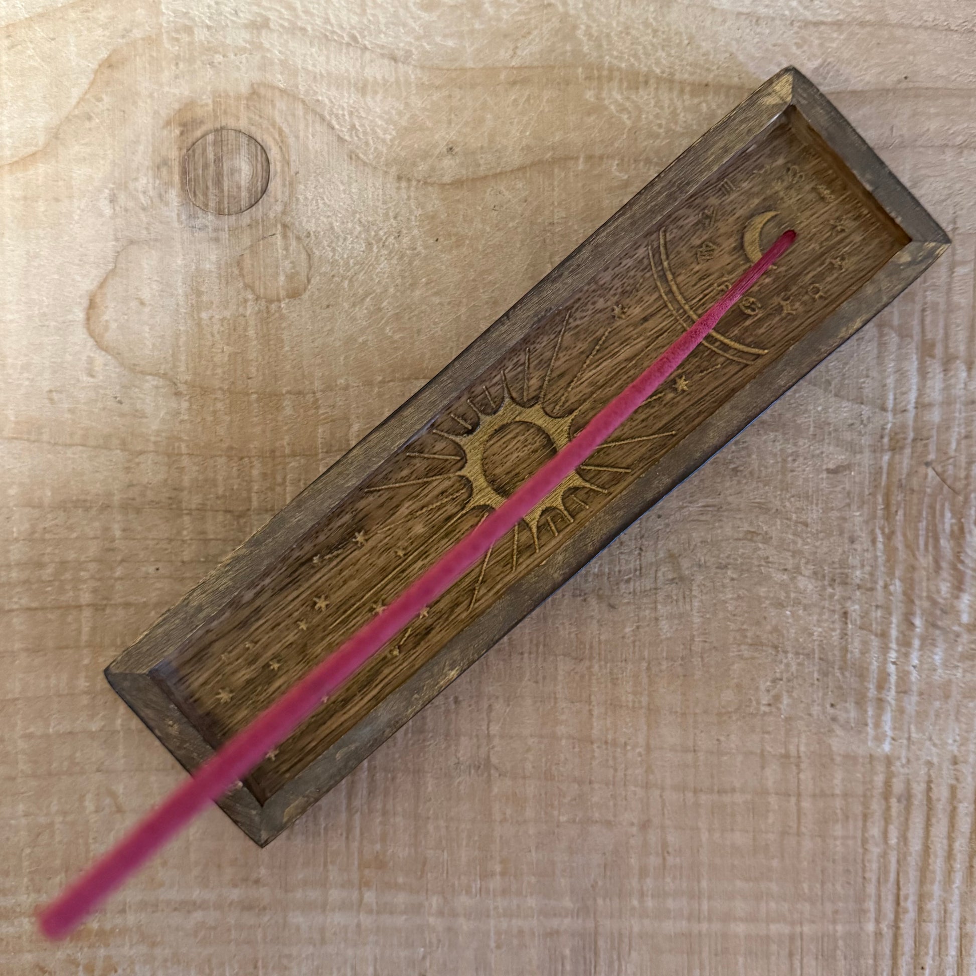 Zodiac incense holder and crystal tray in gold-stamped mango wood. A celestial ritual accessory for incense, crystals, and altar use.