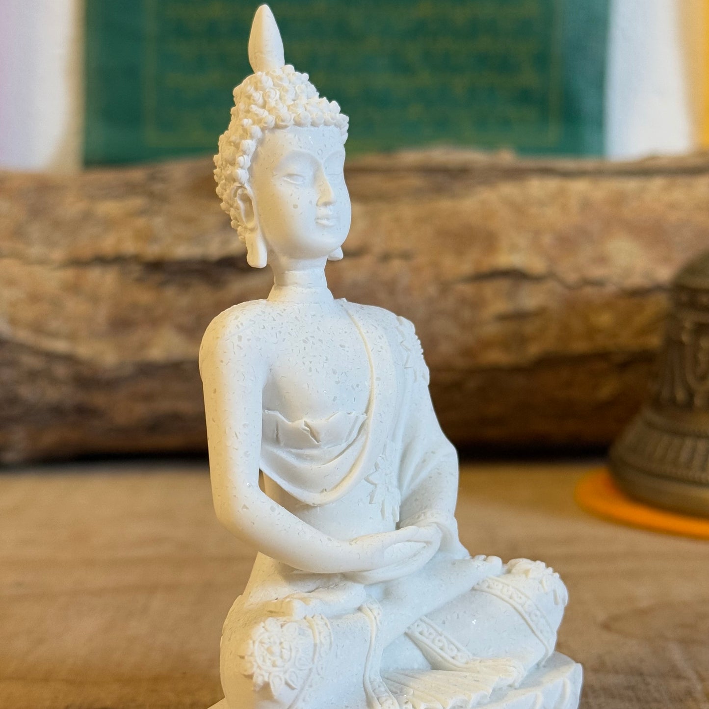 Discover our White Resin Buddha Statue in Dhyana Mudra, embodying meditation and spiritual perfection. Handcrafted with poly resin, this 11x6 cm statue symbolizes enlightenment and the unity of mind and world. Ideal for meditation spaces, altars, or mindful decor."