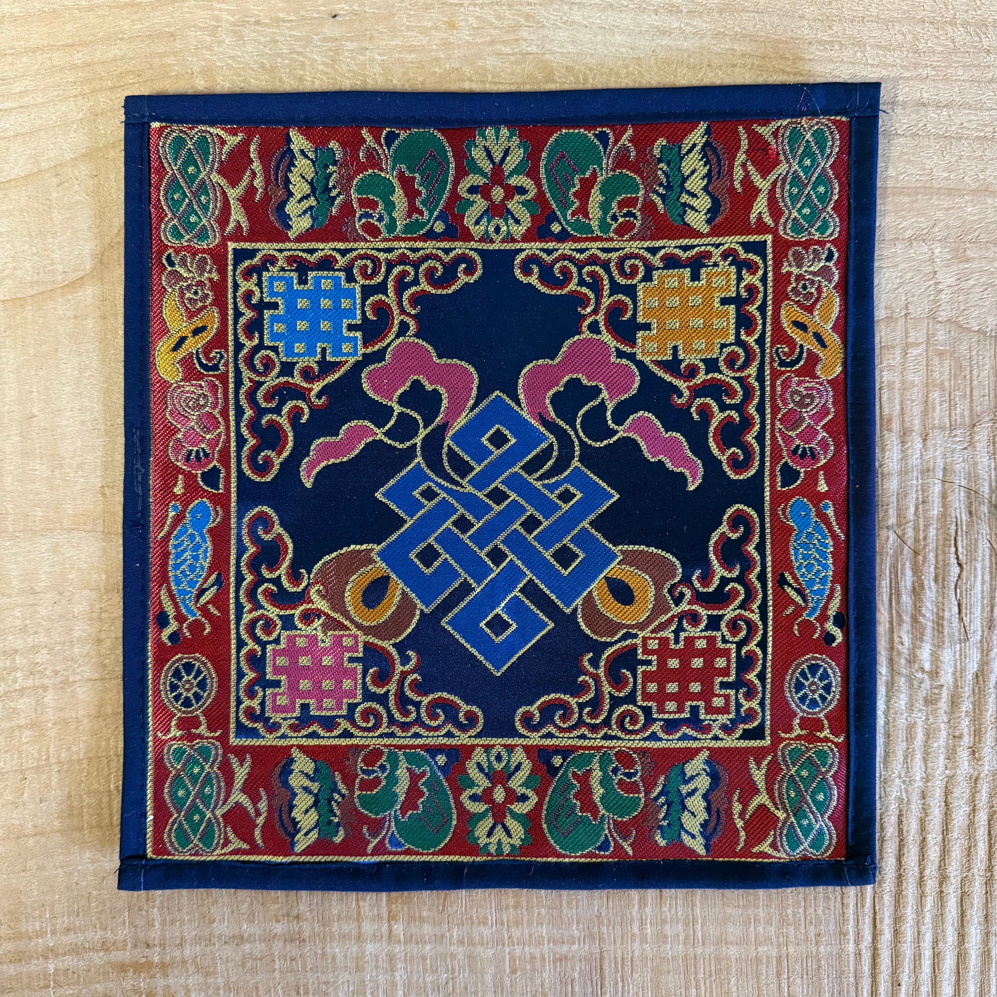 Handcrafted Tibetan altar cloth with infinity knot for meditation and ritual