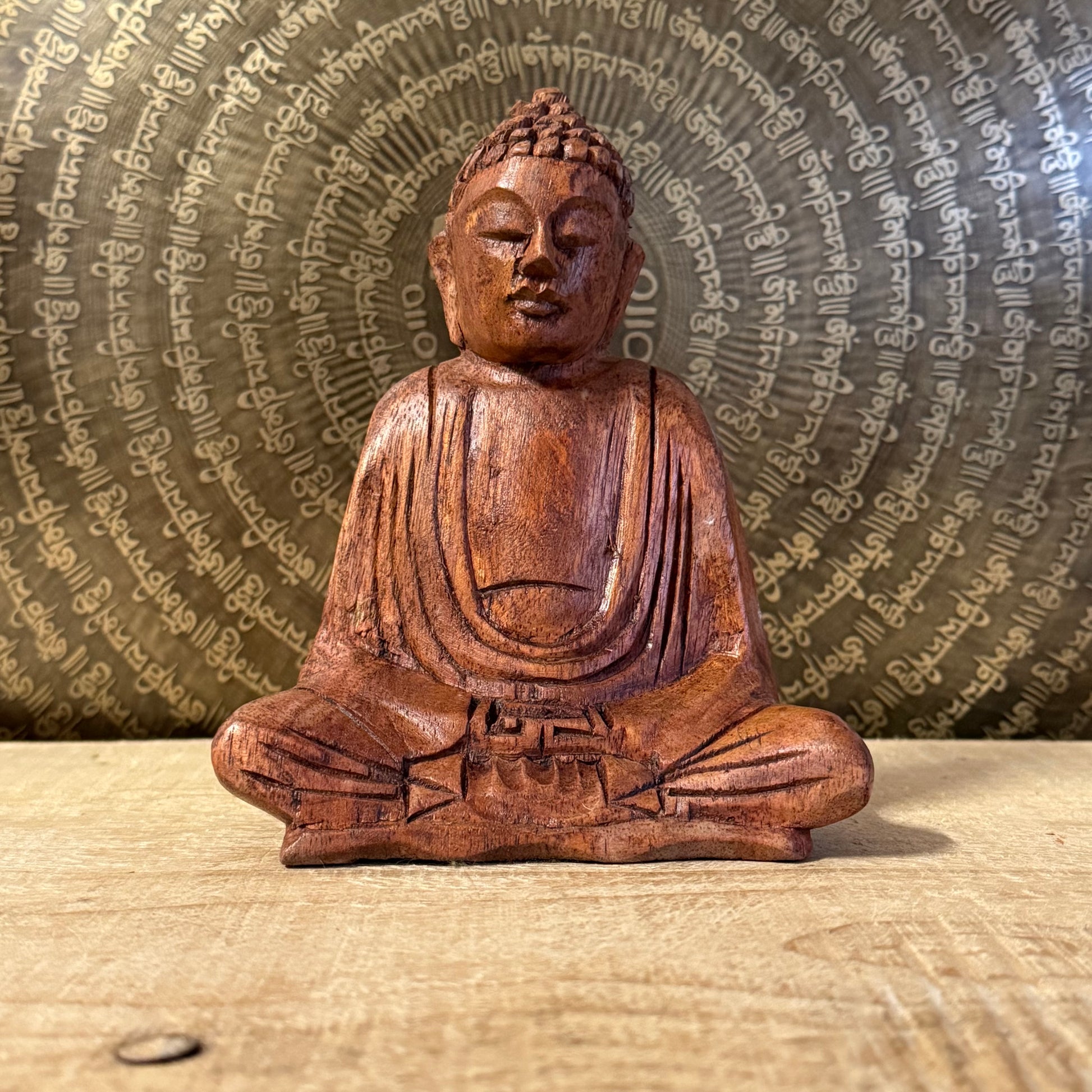 Hand carved 15cm wooden Buddha statue from Bali in the Dhyan Mudra. A serene meditation figure perfect for altars, sacred spaces and spiritual practice.