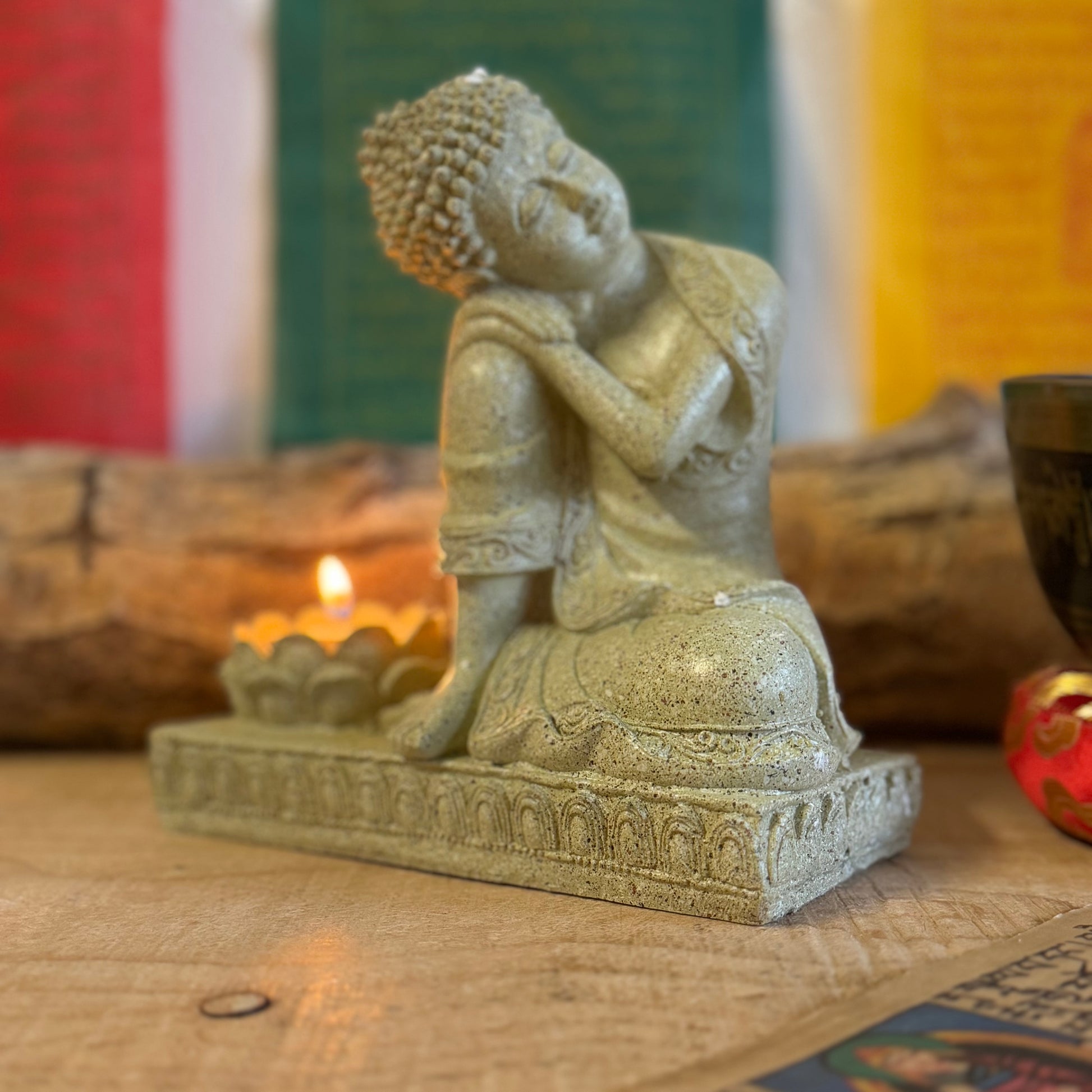 Elevate your space with this beautifully crafted Serene Relaxing Buddha Statue, perfect for creating a calming ambiance. Made from high-quality resin, the statue showcases intricate details, from the gentle expression of the Buddha to the delicately designed lotus flower that serves as a candle holder.