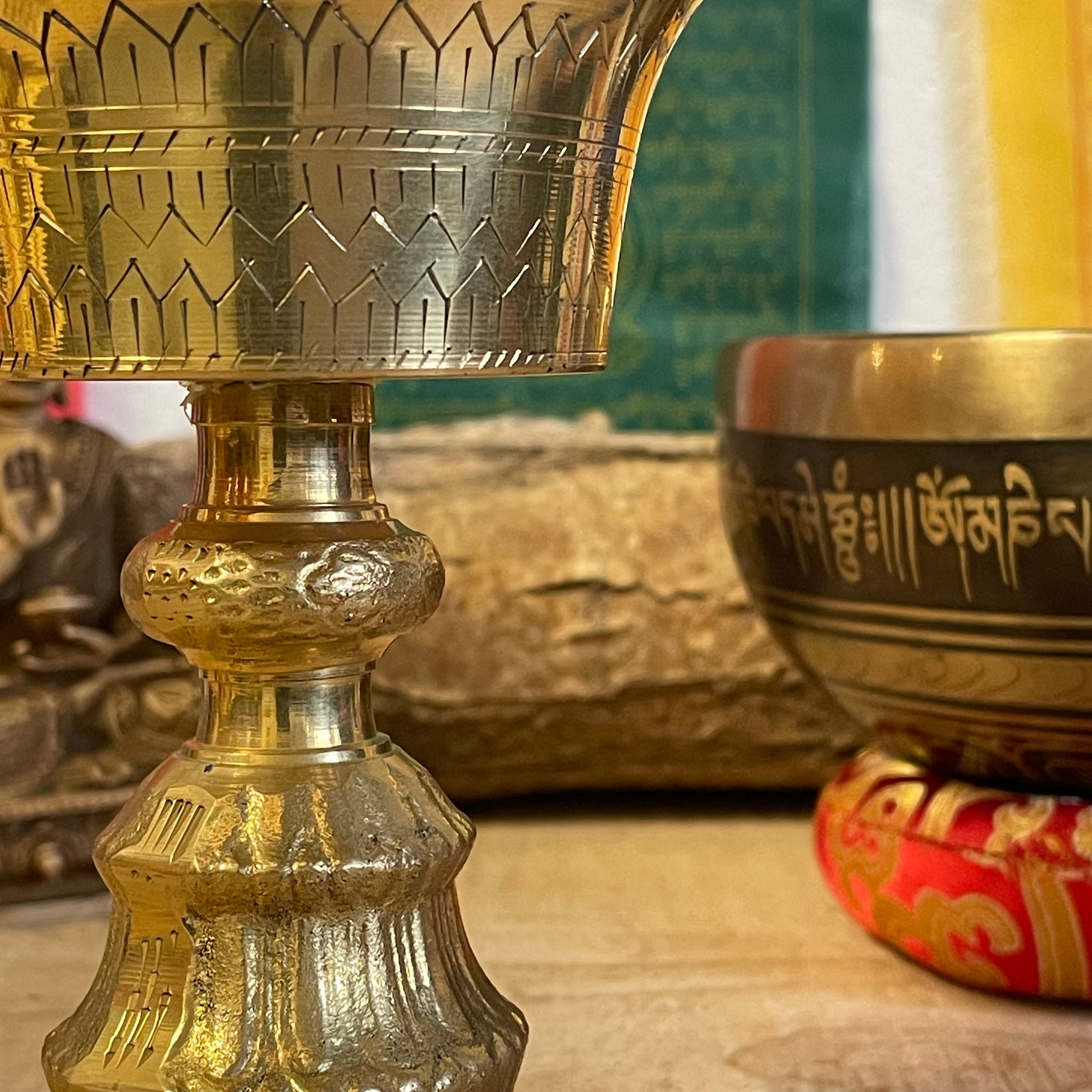 A traditional Tibetan Buddhist Butter lamp made from Brass.

Butter lamps are to be found in all Tibetan Buddhist temples and monasteries throughout the Himalayas. The lamps traditionally burn clarified yak butter, but now often use vegetable oil or vegetable ghee. Each morning Tibetan Buddhists offer butter lamps to represent the illumination of wisdom.