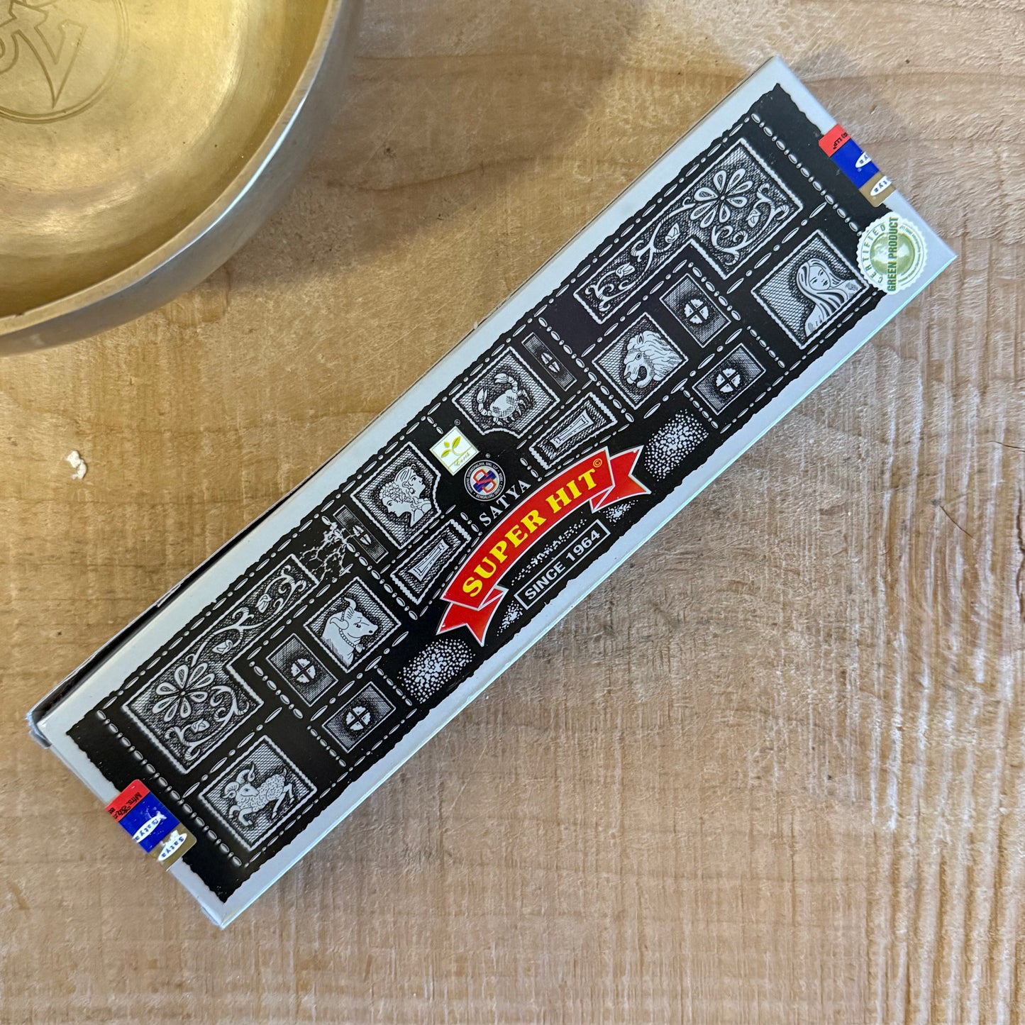 Satya Super Hit incense 100g large box from the Nag Champa Collection. Hand-rolled sandalwood incense for meditation, ritual, and cleansing.