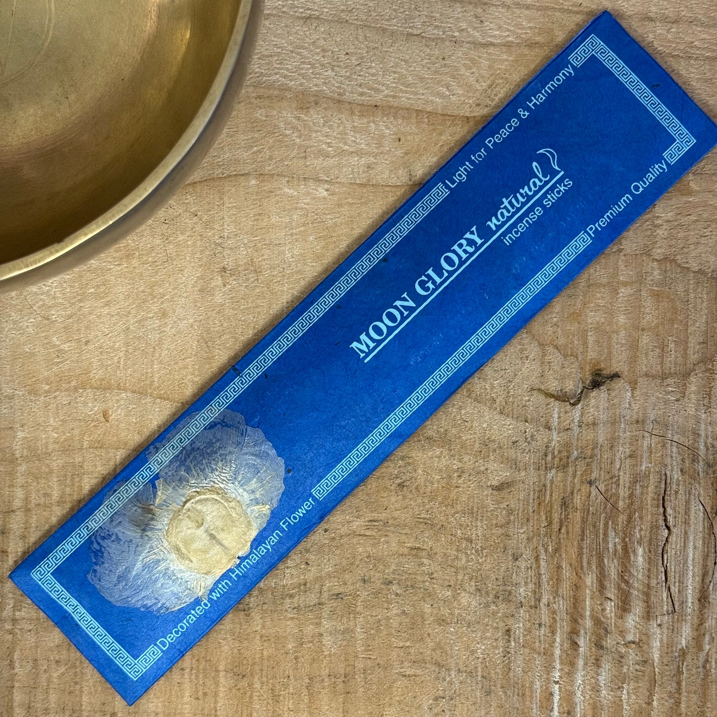 Moon Glory Flora handmade Nepalese incense in Lokta paper with Himalayan flower decoration.