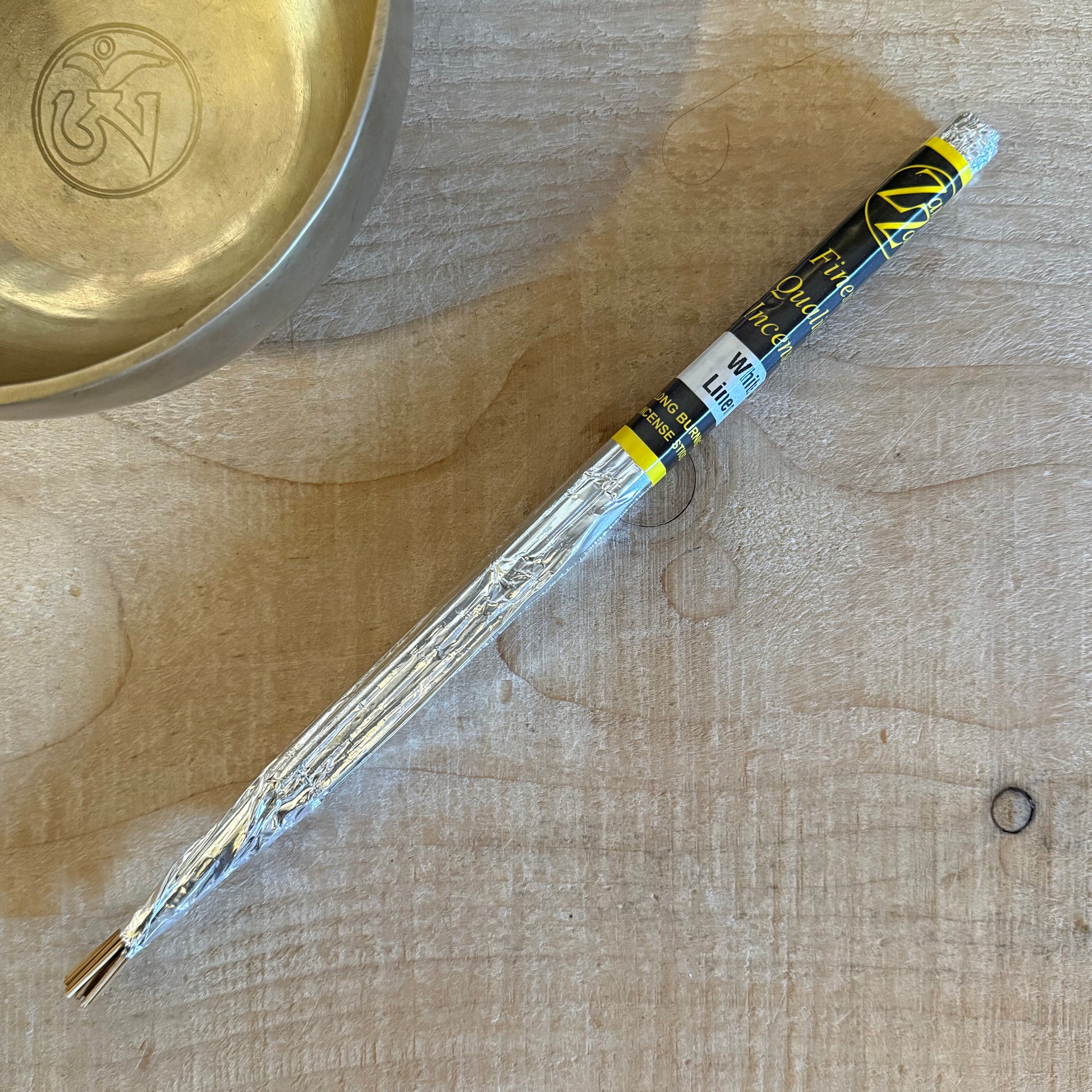 Zam Zam White Linen incense sticks with a clean, fresh aroma. Long burning hand rolled incense for meditation, relaxation, and space cleansing.