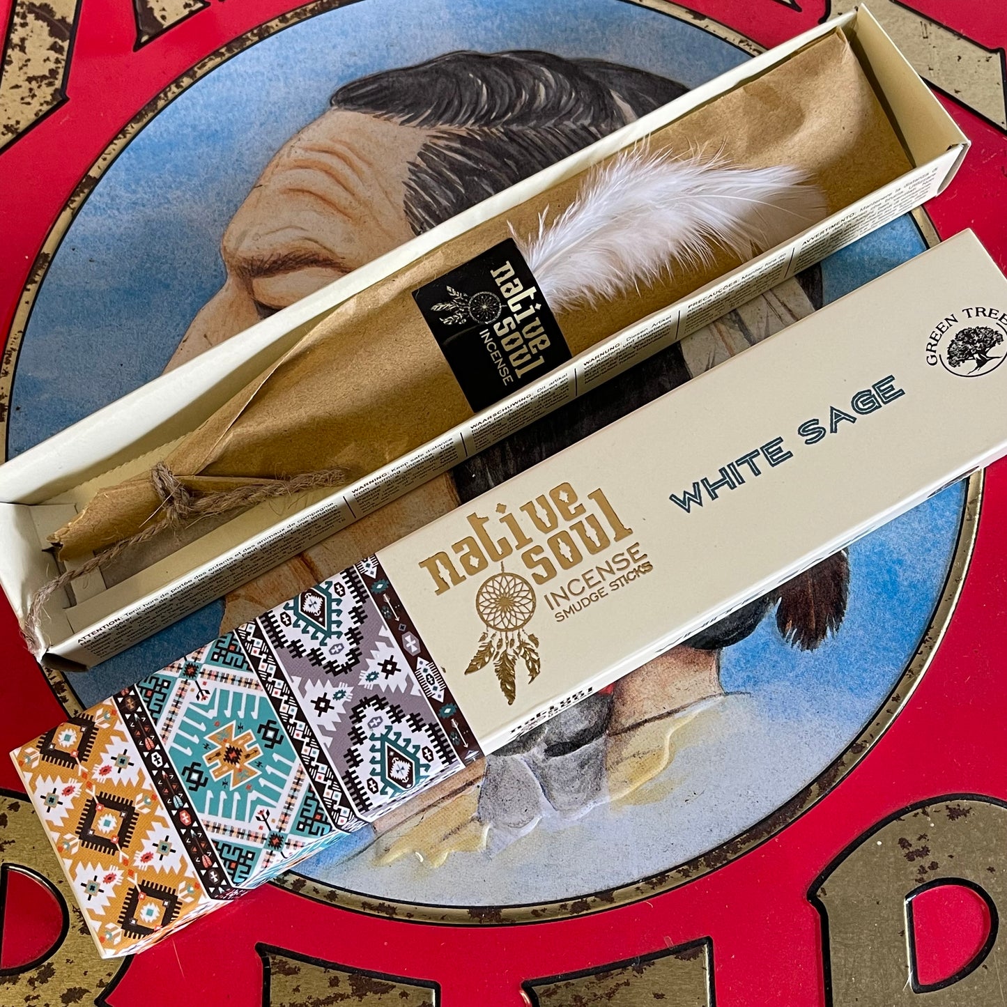 The Native Soul White Sage incense sticks are expertly blended to create a tranquil environment and promote inner balance. They come in a beautifully-designed sliding box with a native American print on the outside and a delicate feather on the inside, adding to the overall experience. Indulge in true relaxation and holistic healing with Native Soul's White Sage incense sticks. Expertly crafted to create a tranquil environment and promote inner balance, each stick is thoughtfully packaged in a beautifully-d