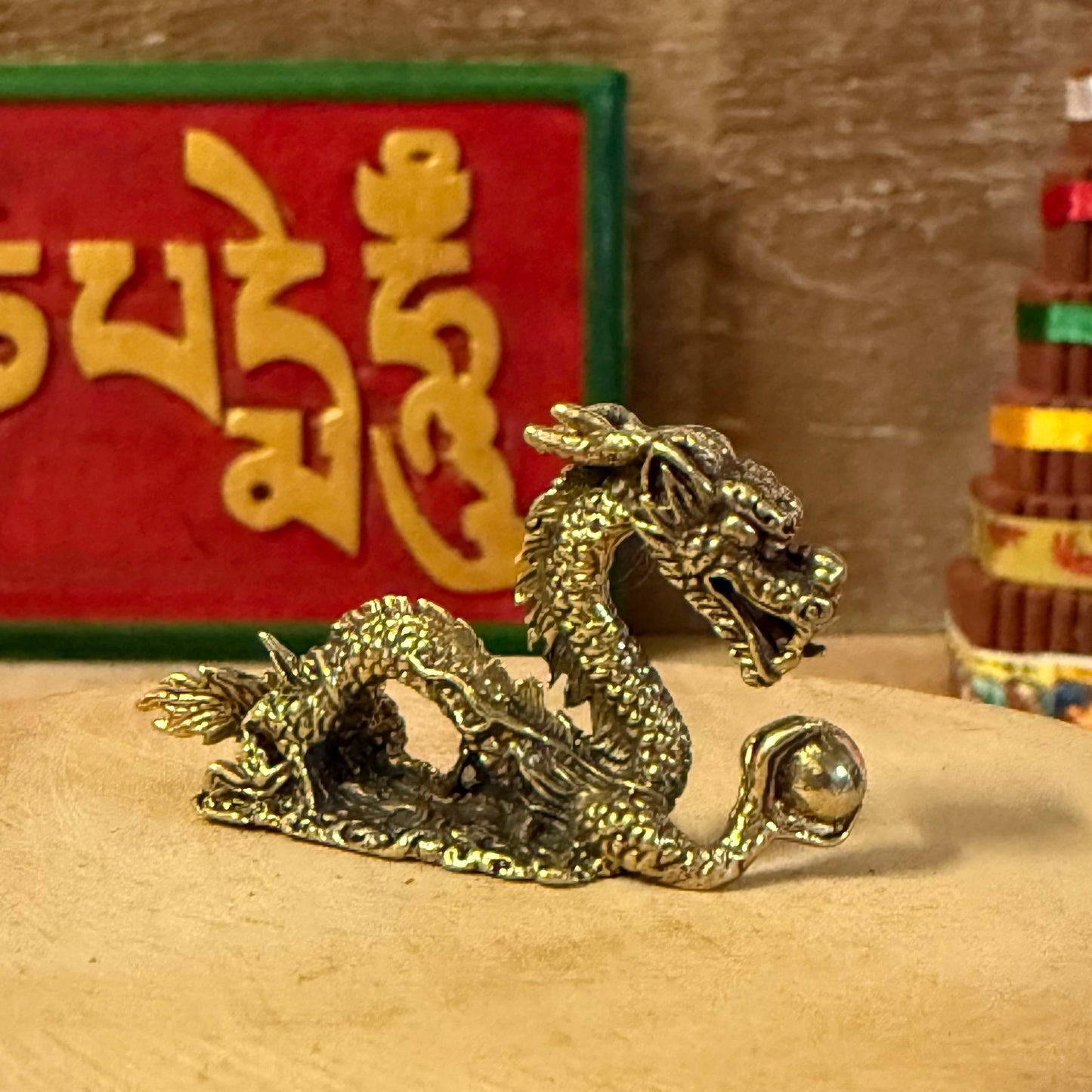 Embodying the ancient spirit of strength and transformation, the Mini Brass Dragon is a finely detailed sculpture handcrafted in Bali from solid brass. Each piece is cast using traditional metalworking techniques, where molten brass is poured into a mould and finished by hand, revealing the dragon’s intricate scales and expressive form.