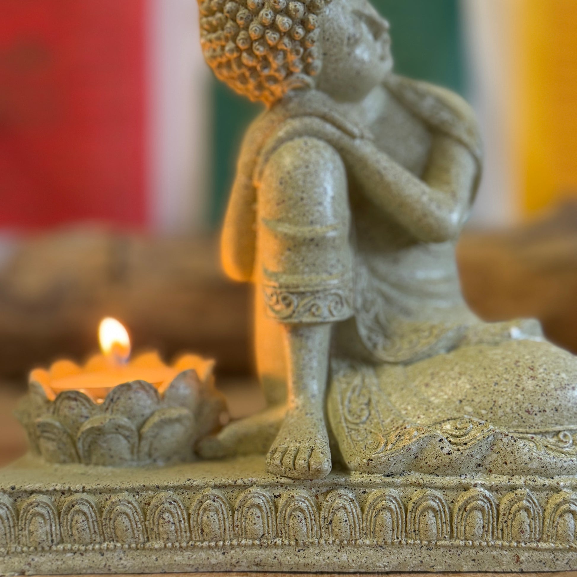 Elevate your space with this beautifully crafted Serene Relaxing Buddha Statue, perfect for creating a calming ambiance. Made from high-quality resin, the statue showcases intricate details, from the gentle expression of the Buddha to the delicately designed lotus flower that serves as a candle holder.