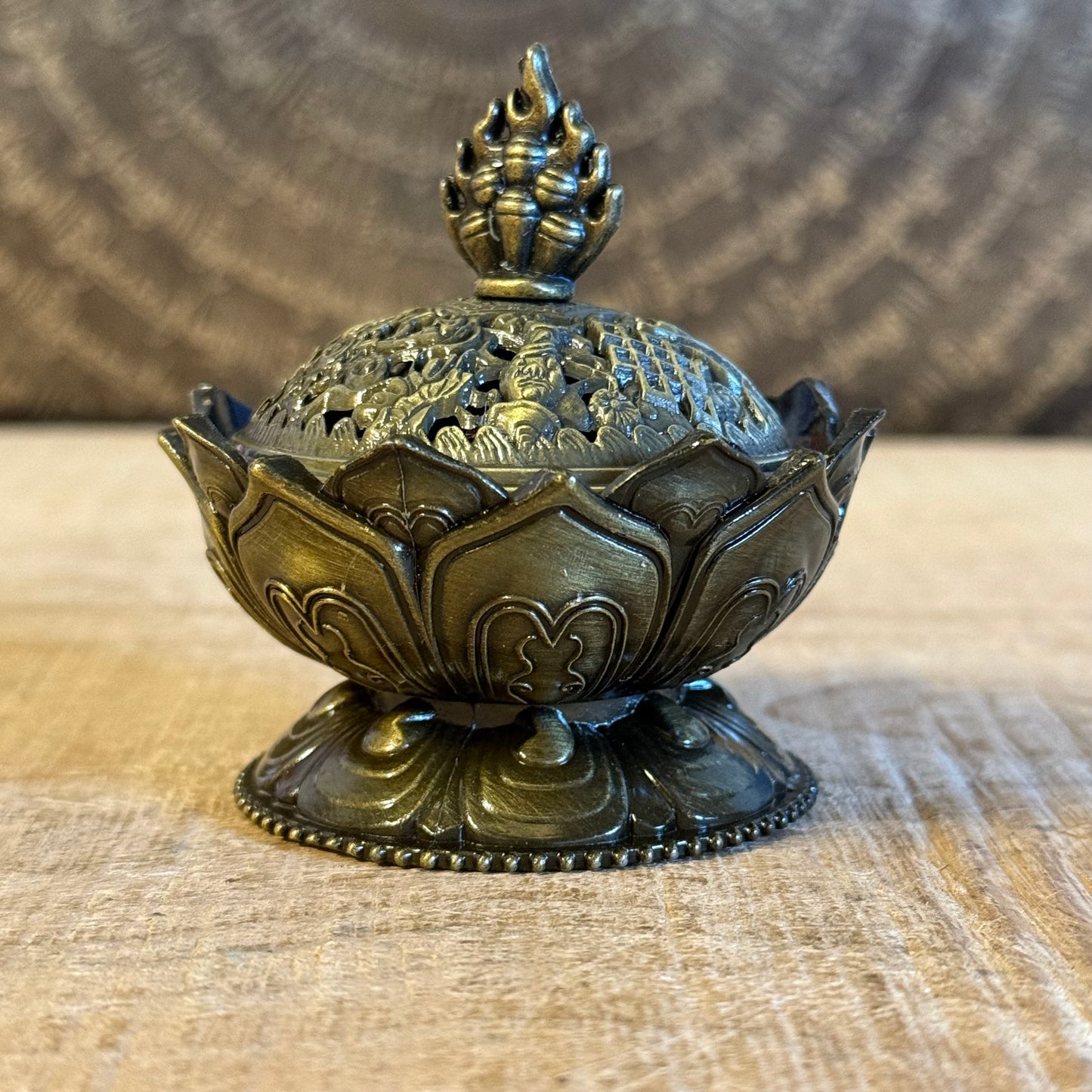 Brass lotus cone incense holder inspired by the sacred lotus. Ideal for incense cones, meditation, ritual use, and peaceful sacred spaces.