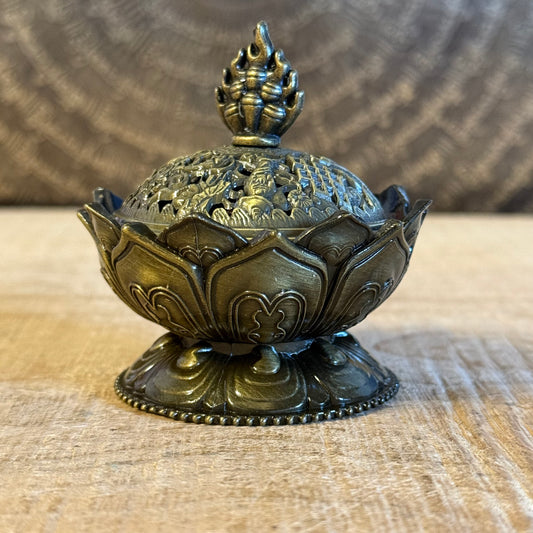 Brass lotus cone incense holder inspired by the sacred lotus. Ideal for incense cones, meditation, ritual use, and peaceful sacred spaces.