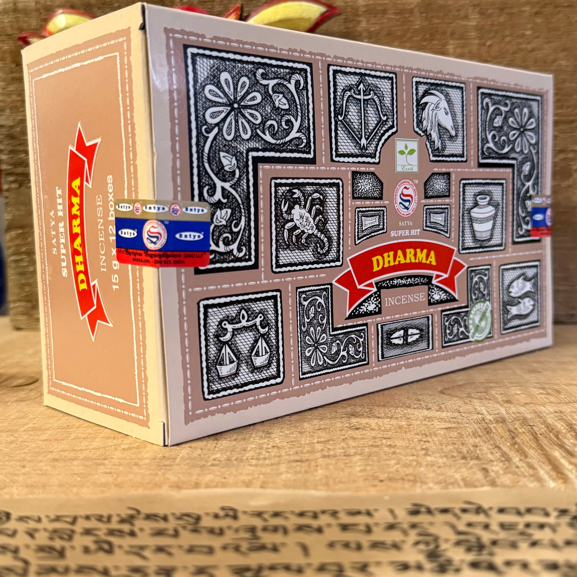 Welcome to the sacred fragrance of Satya Super Hit Dharma Incense, a timeless creation from the renowned Shrinivas Sugandhalaya Nag Champa Collection. Crafted on a pure sandalwood base and blended with delicate flower oils, this incense is revered in Buddhist temples across the world.