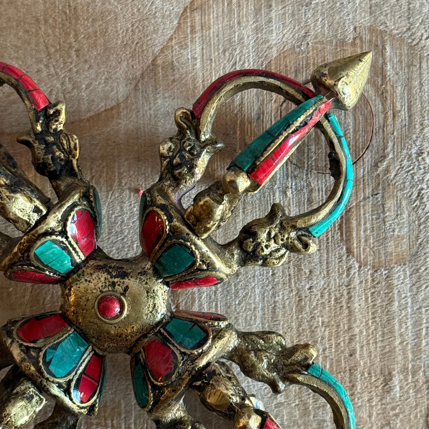 Handmade Flower Double Dorje vajra in solid brass with turquoise inlay. A powerful Tibetan Buddhist ritual object for altar and meditation use.