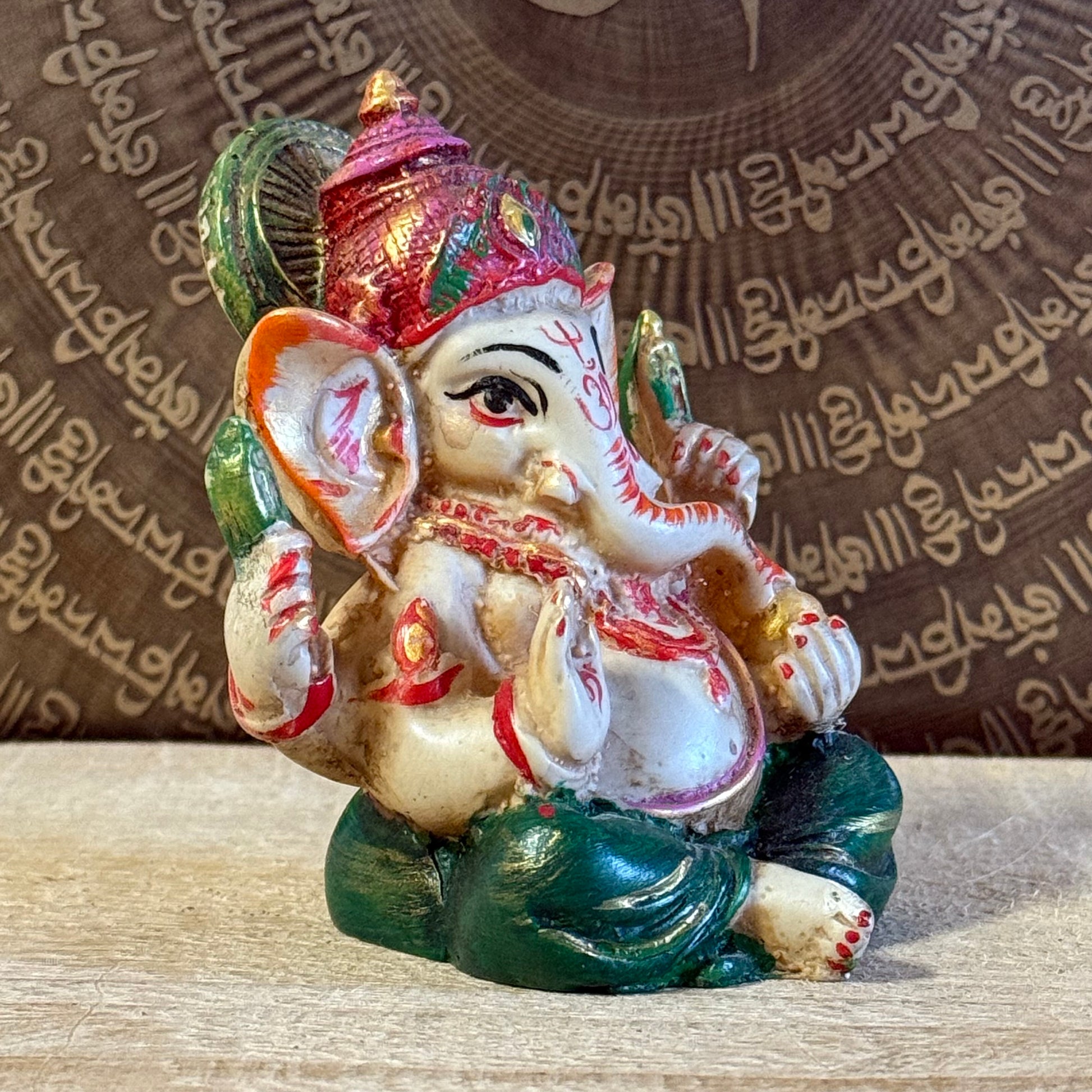 Hand-painted 9 cm Ganesh resin statue holding axe, rope, sweetmeats, blessing mudra with mouse vahana