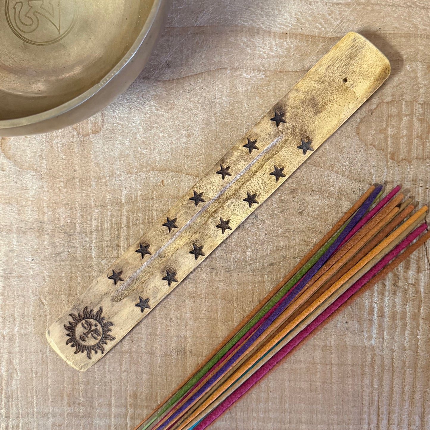 Natural mango wood incense ashcatcher with hand carved sun design 26cm