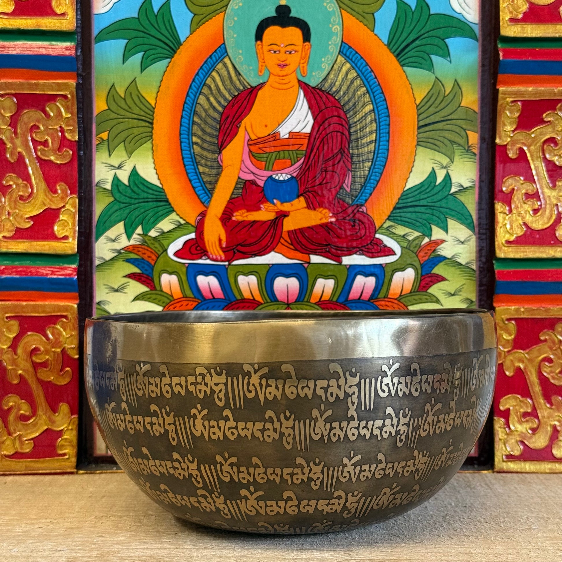 In the stillness of presence, sound becomes sacred. This handmade singing bowl from the mountains of Nepal is not merely an object—it is a vessel of mindfulness, crafted by devoted hands and steeped in centuries of Himalayan wisdom.

This sacred bowl echoes the mantra Om Mani Padme Hum, etched with reverence on both its inner and outer walls. Each stroke in the engraving invites compassion, peace, and the remembrance of our shared path toward awakening.

Exquisite Design: