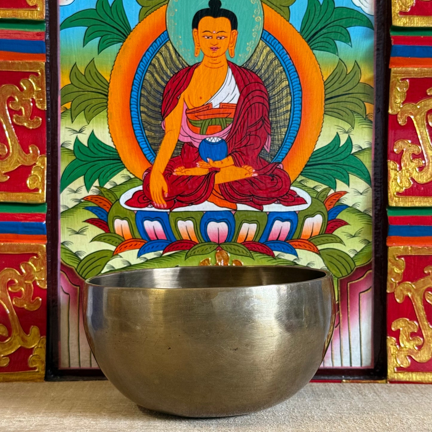 Handmade Medicine Buddha Singing Bowl for Healing & Meditation

Sacred handmade singing bowl with Medicine Buddha engraving. Perfect for healing, meditation, sound therapy, and spiritual awakening.
